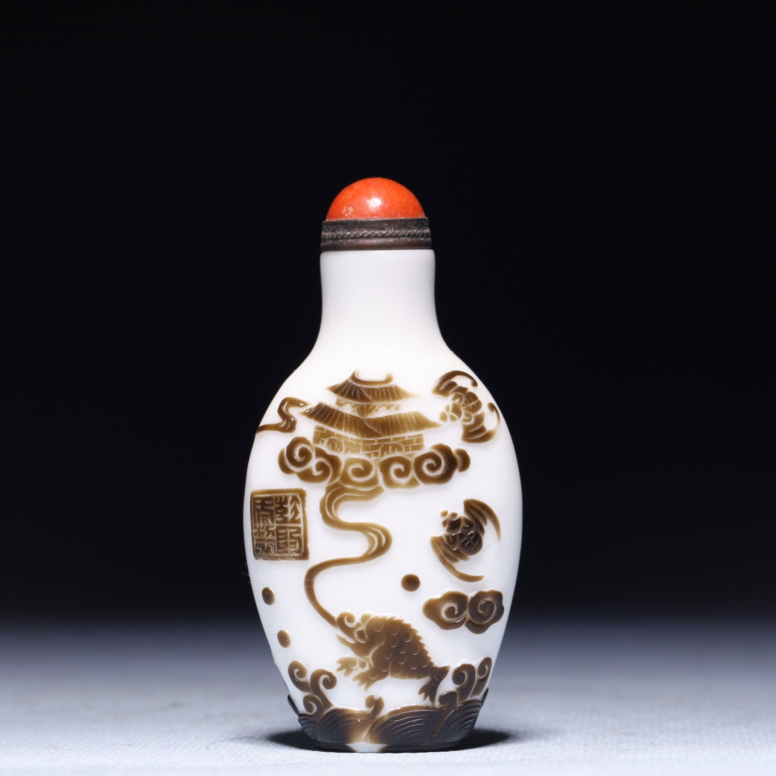An Exquisite Glass Kylin Pattern Snuff Bottle: An Exquisite Glass Kylin Pattern Snuff Bottle,Qing Dynasty,China,Qianlong Four-character Mark,Size:1.6inx0.8inx2.8in,Weight:53.5g