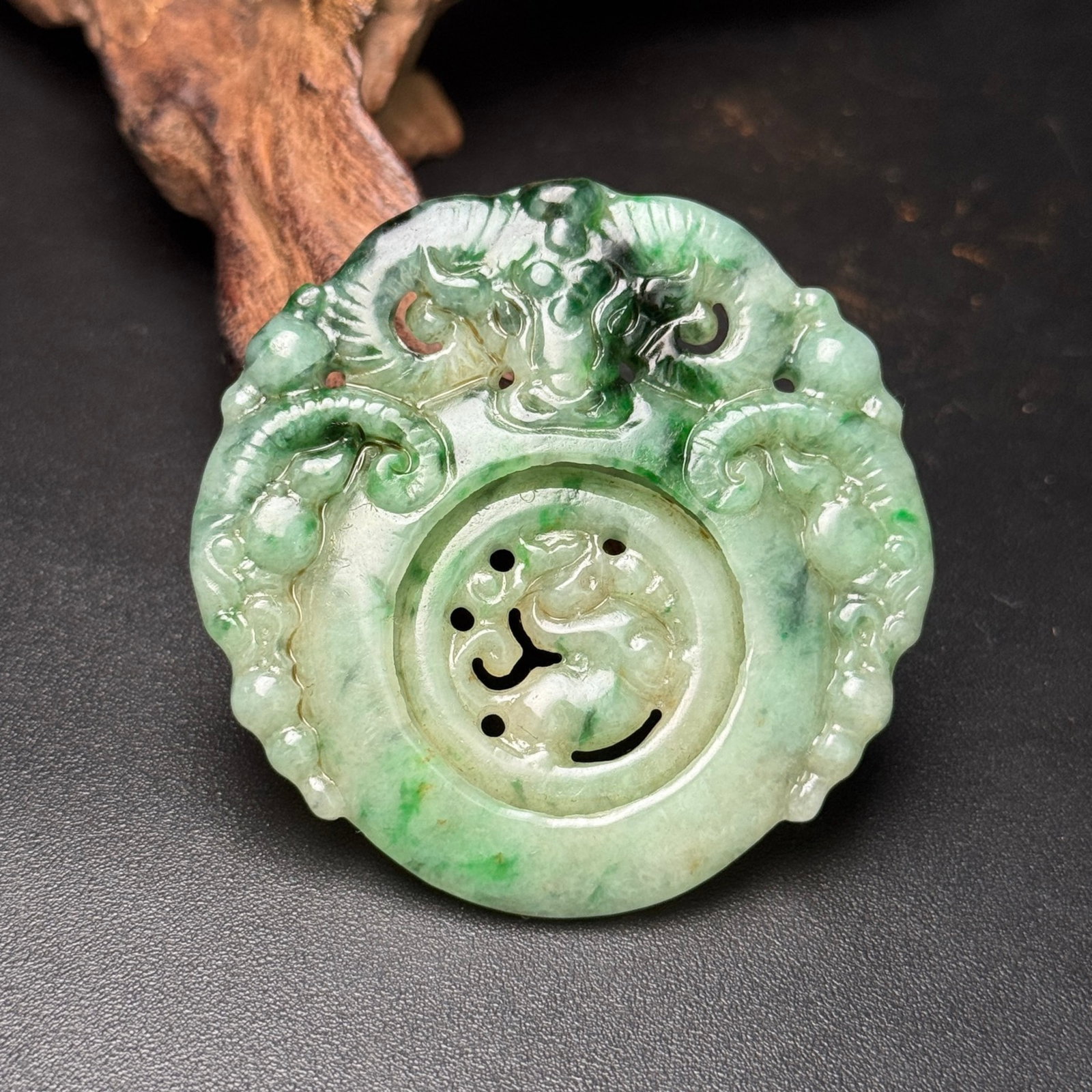 An Exquisite Jadeite Sheep Pattern Pendant