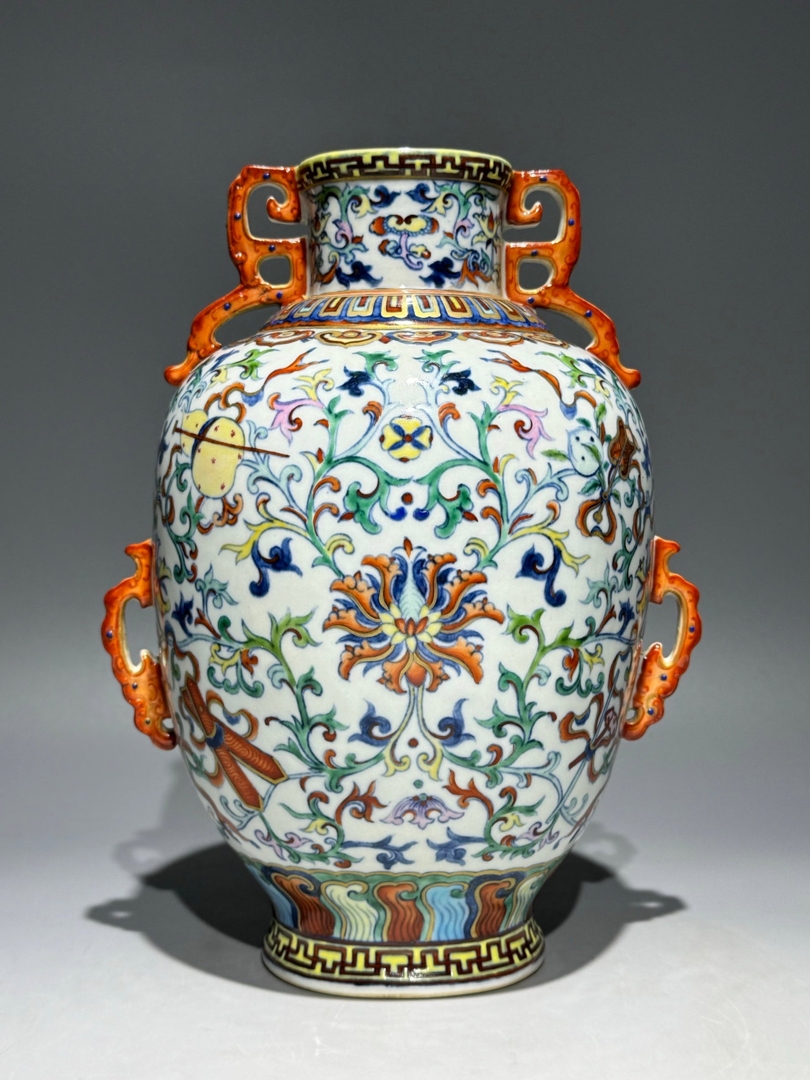 An Exquisite Doucai Lotus Pattern Double-Ears Vase: An Exquisite Doucai Lotus Pattern Double-Ears Vase,Qing Dynasty,China,Qianlong Six-character Mark,Size:9.1inx6.7in