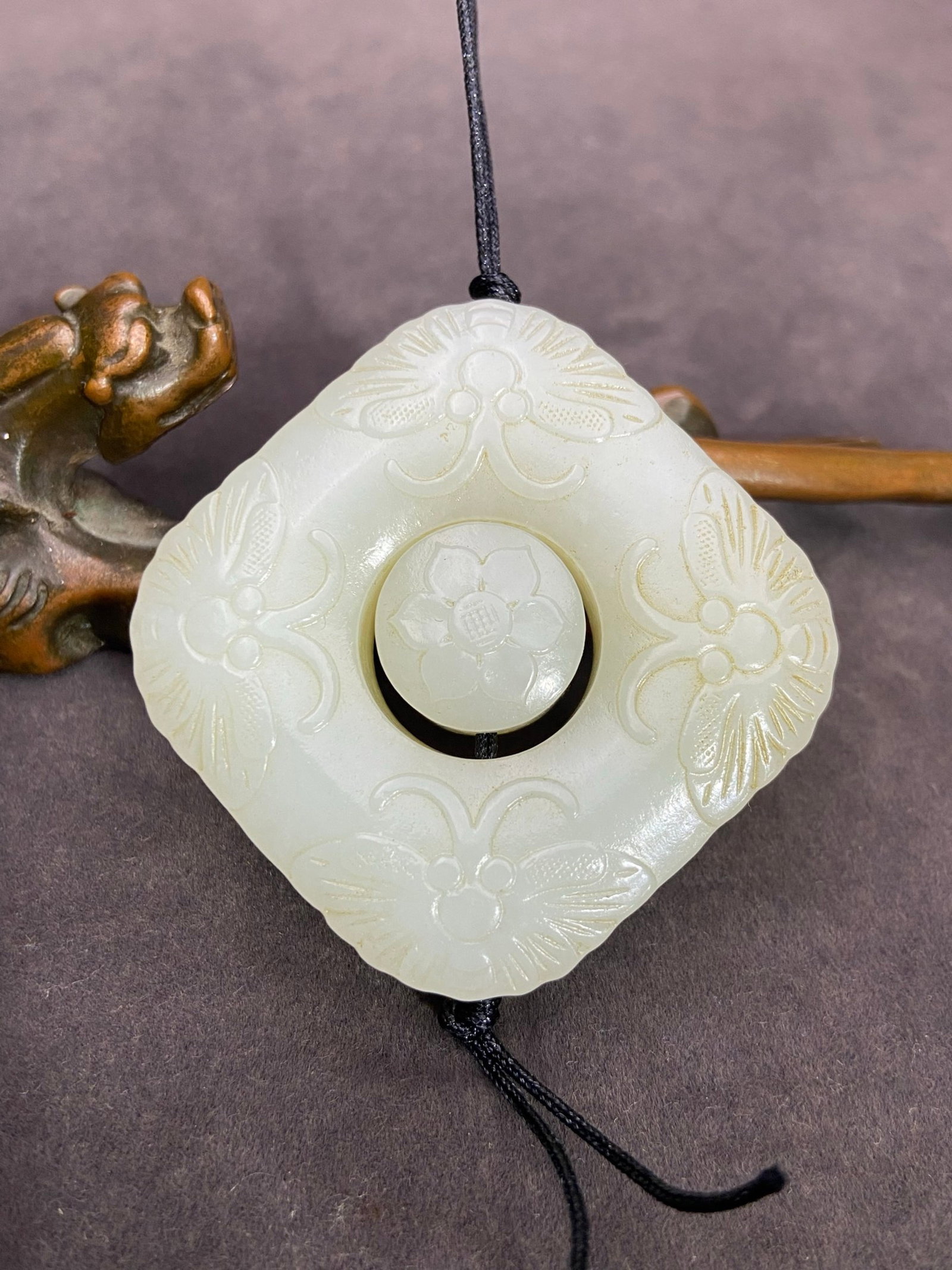 An Exquisite White Jade Flower and Butterfly Pattern Pendant: An Exquisite White Jade Flower and Butterfly Pattern Pendant,Qing Dynasty,China,Size:1.8inx1.8inx0.5in,Weight:62g