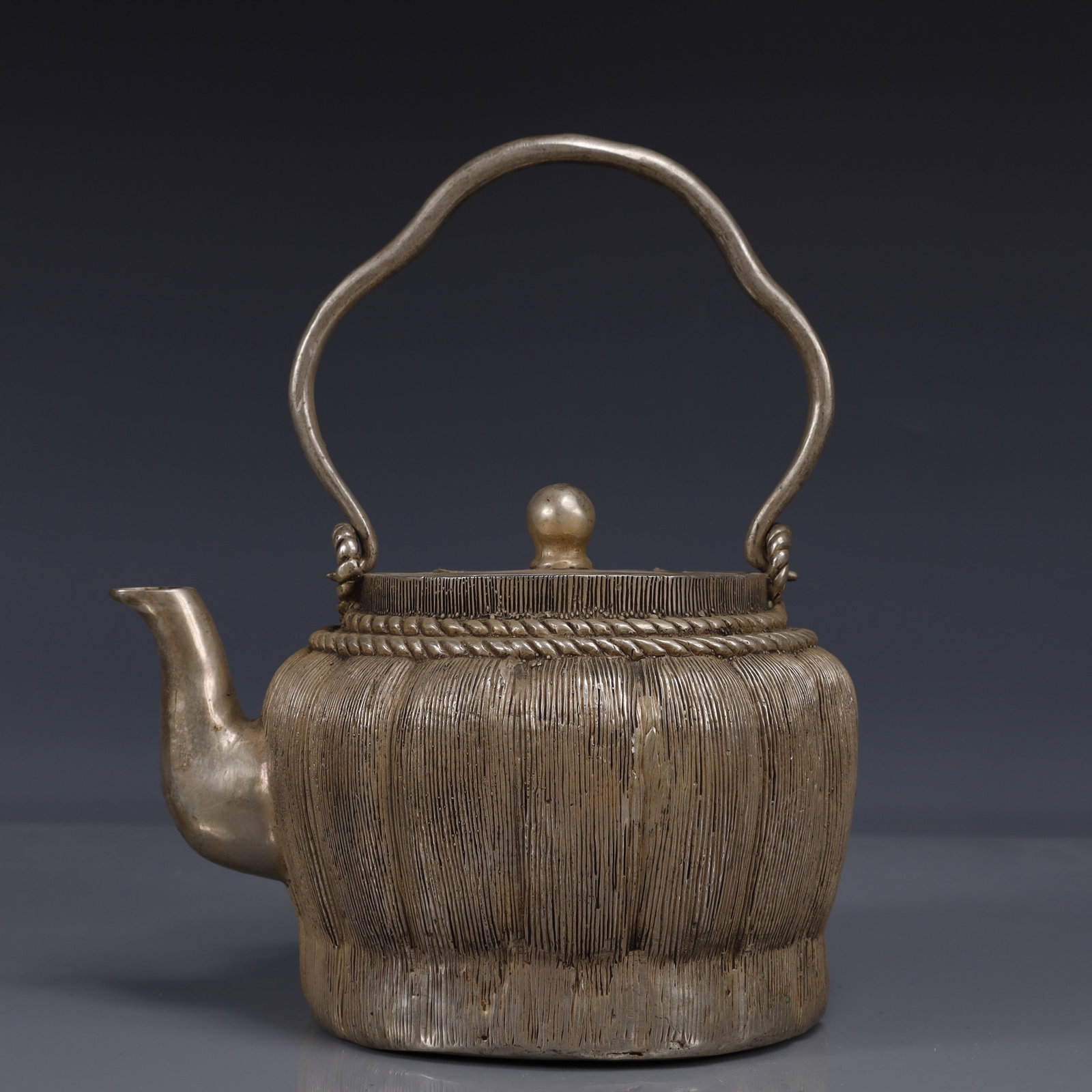 An Exquisite Silver-Plated Bronze Ewer: An Exquisite Silver-Plated Bronze Ewer,The Republic of China,Size:5.1inx7.1inx8.7in,Weight:1250g 铜镀银执壶,中国民国时期
