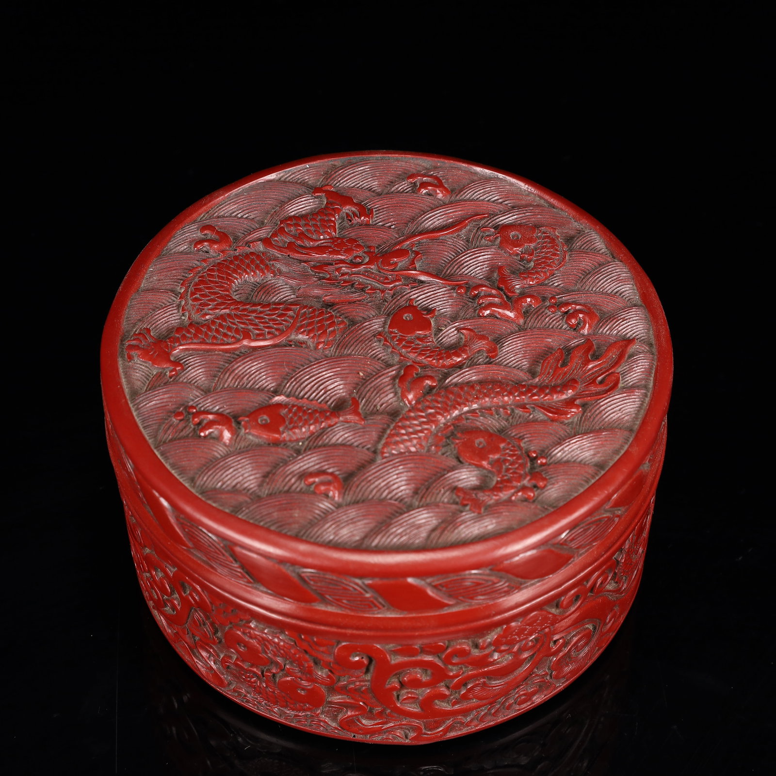 An Exquisite Carved Red Lacquer Dragon and Fish Pattern Box with Cover: An Exquisite Carved Red Lacquer Dragon and Fish Pattern Box with Cover,Qing Dynasty, China,Qianlong Four-character Mark,Size:5.5inx3in,Weight:650g 剔红漆器龙鱼ń