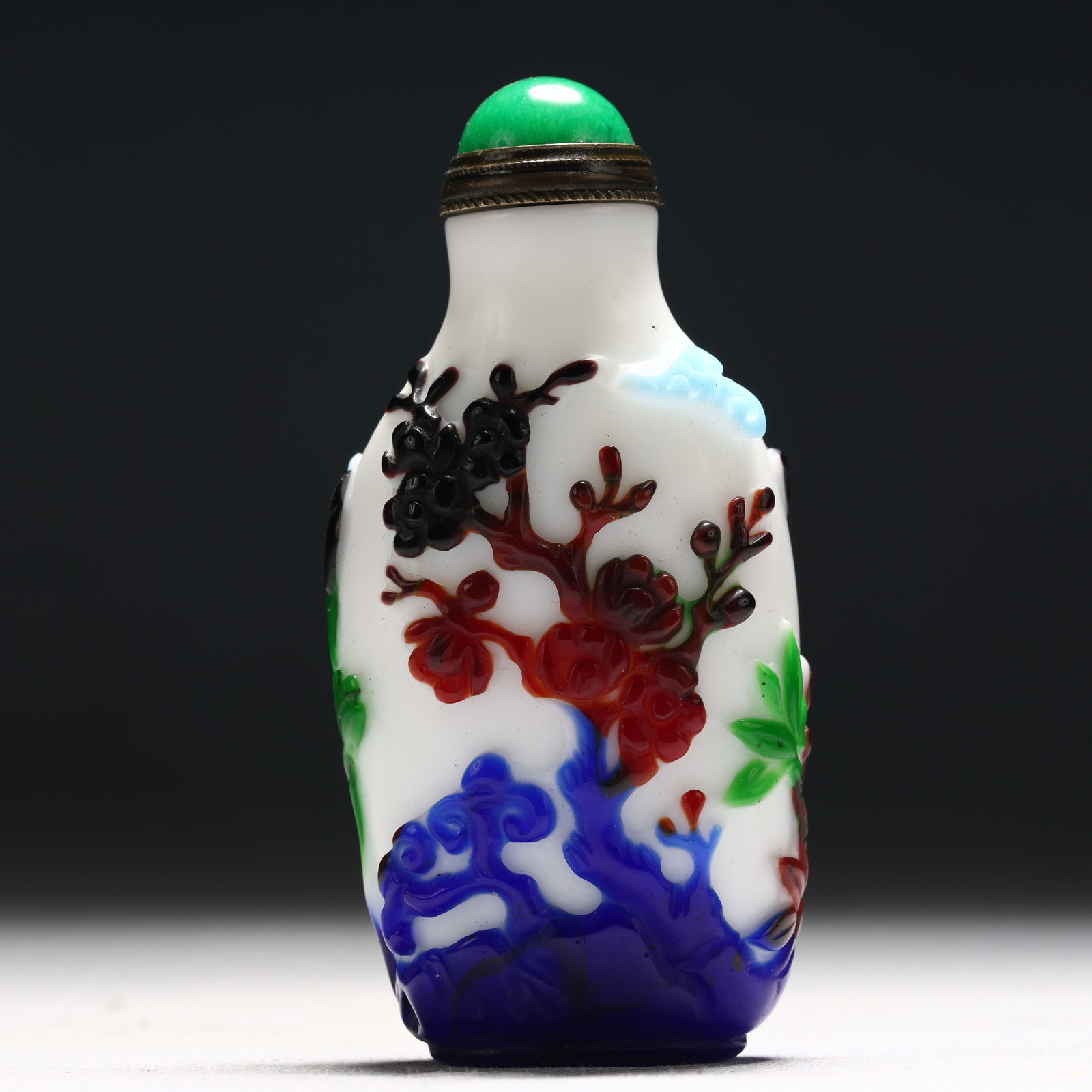 An Exquisite Glass Multi-Color Overlay Flower and Fish Pattern Snuff Bottle: An Exquisite Glass Multi-Color Overlay Flower and Fish Pattern Snuff Bottle,Qing Dynasty, China,Qianlong Four-character Mark,Size:1.4inx0.7inx3in