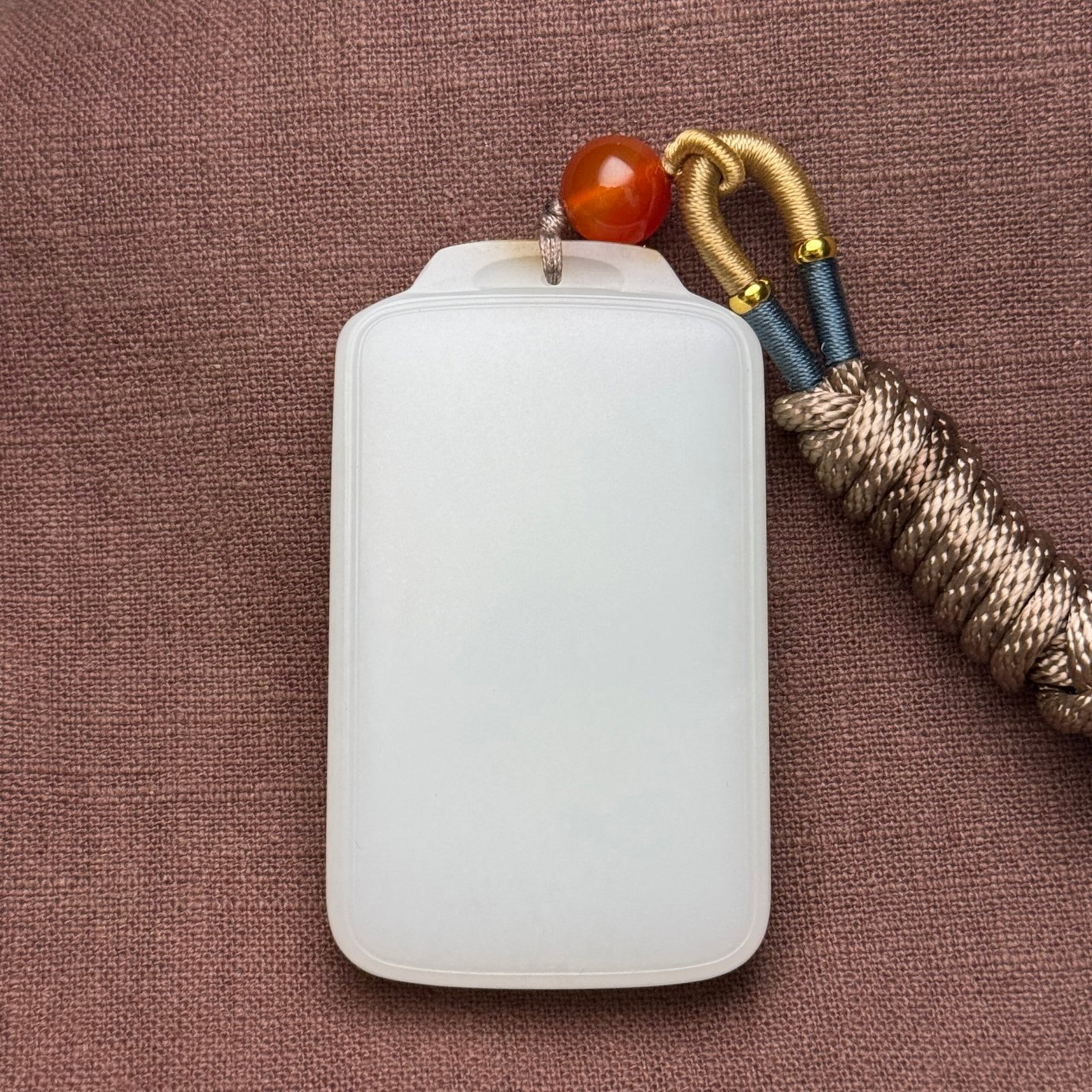 An Exquisite White Jade Pendant: An Exquisite White Jade Pendant,Qing Dynasty,China,Size:2.7inx1.6inx0.5in,Weight:102g 白玉挂件,中国清代