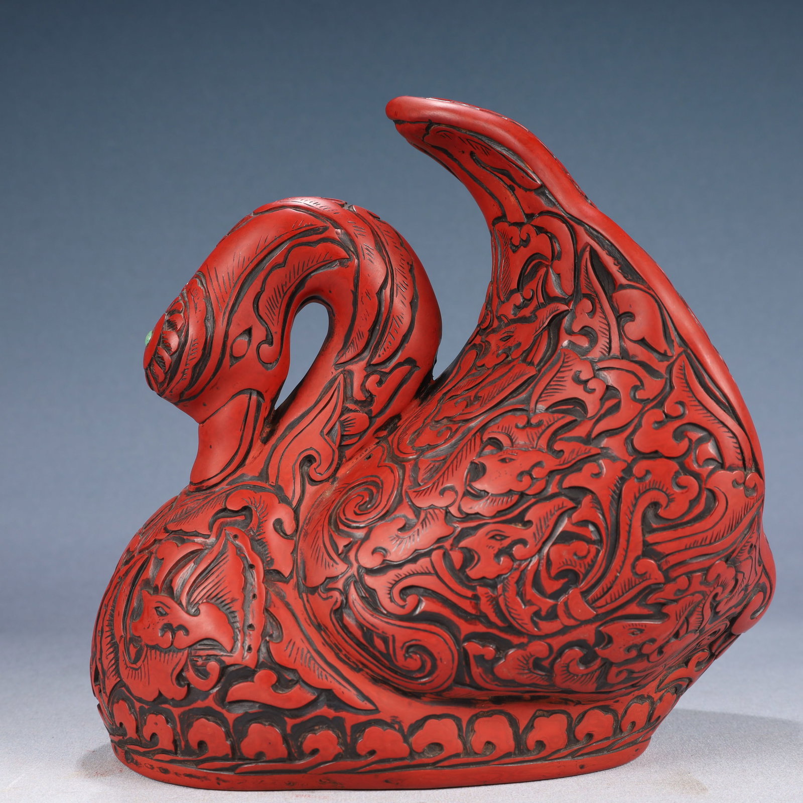 An Exquisite Carved Red Lacquer Goose Ornament: An Exquisite Carved Red Lacquer Goose Ornament,Qing Dynasty, China,Size:8.7inx5.1inx9.1in,Weight:1050g 剔红漆鹅摆件,中国清代