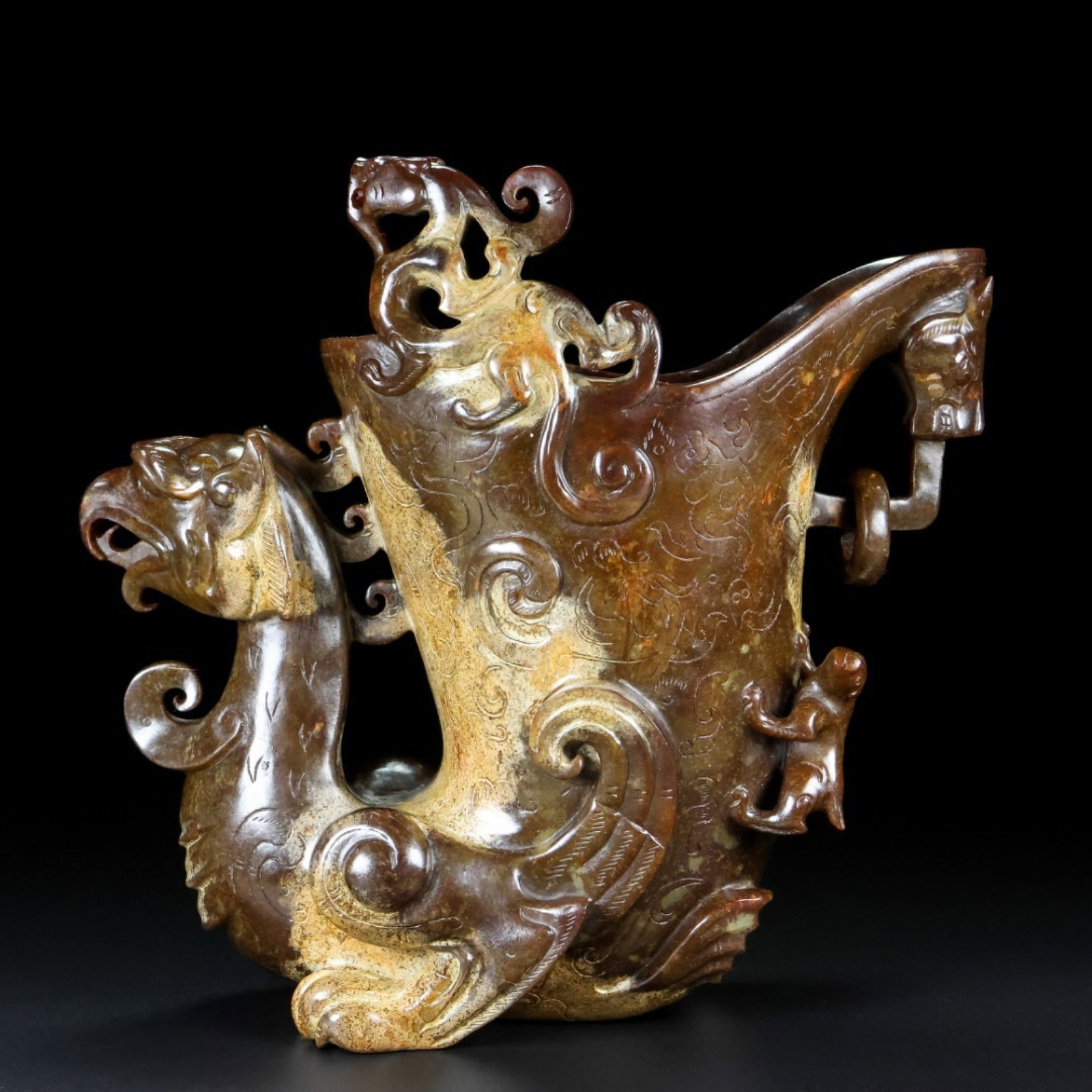 An Exquisite Archaic Jade Phoenix Goblet (1 of 9)