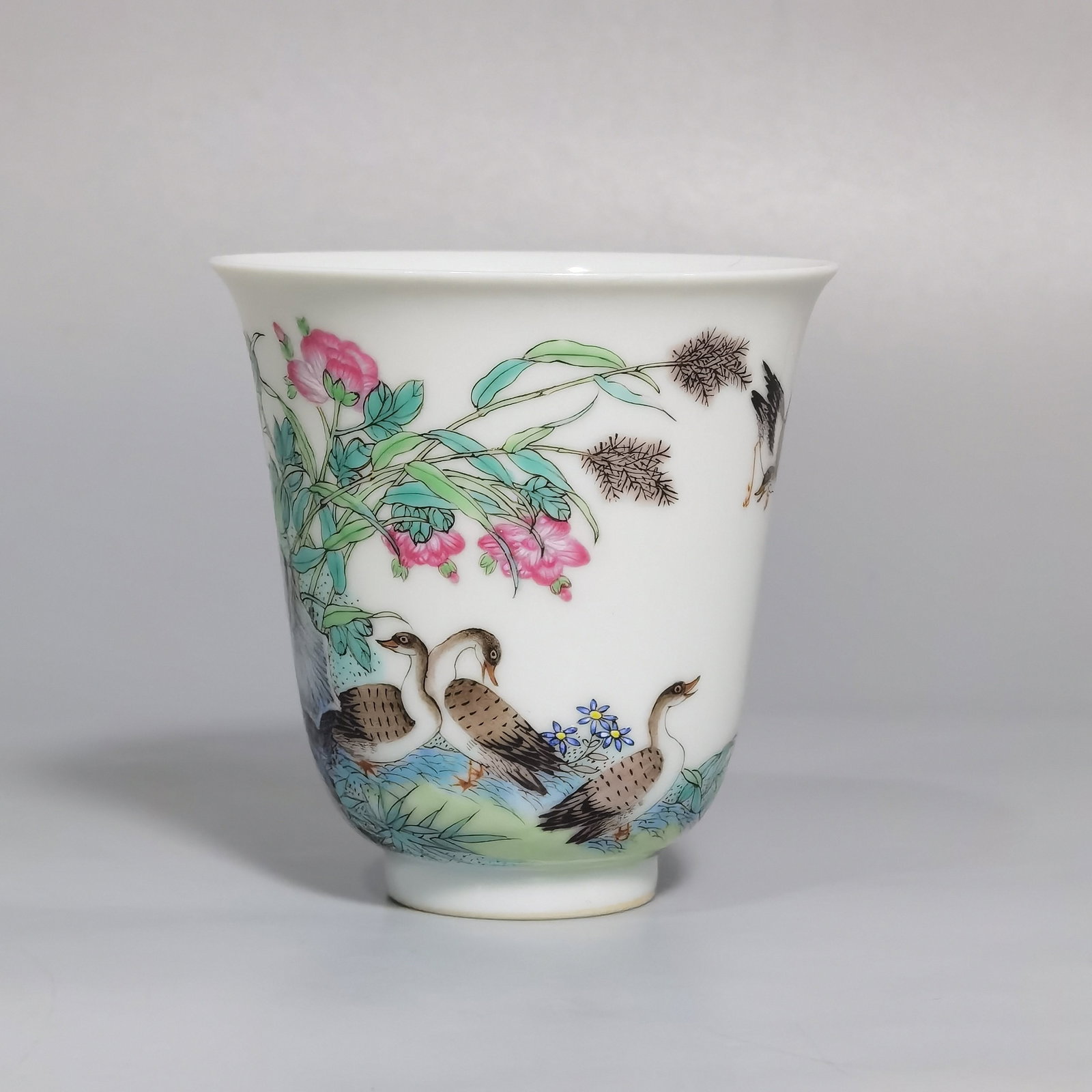 An Exquisite Enamel Flower and Bird Pattern Cup,with poem: An Exquisite Enamel Flower and Bird Pattern Cup,with poem,Qing Dynasty,China,Qianlong Four-character Mark,Size:2.4inx2.5in