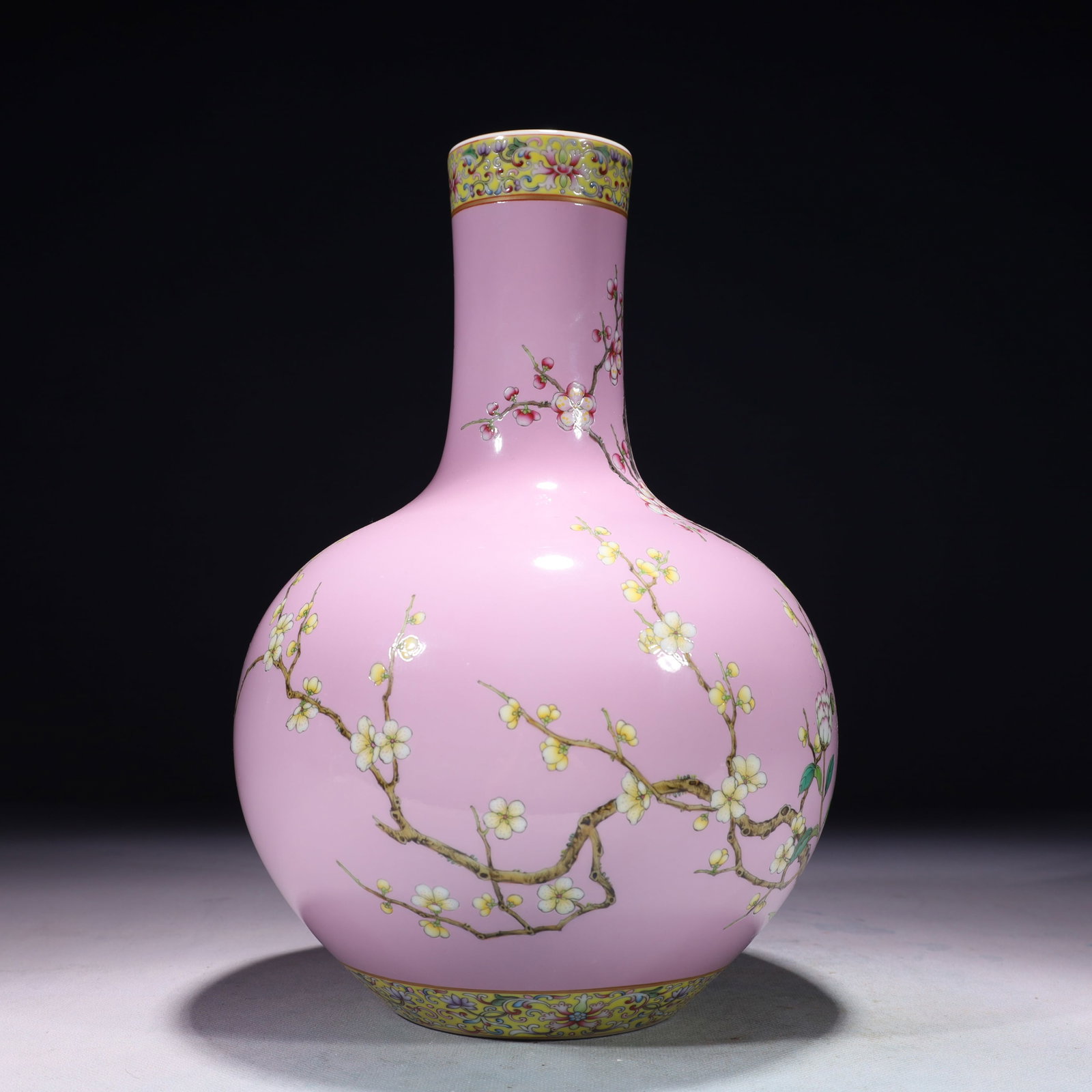 An Exquisite Pink Ground Famille-Rose Painted Gold Flower Pattern Vase: An Exquisite Pink Ground Famille-Rose Painted Gold Flower Pattern Vase,Qing Dynasty,China,Yongzheng Six-character Mark,Size:7.5inx12.2in,Weight:2200g