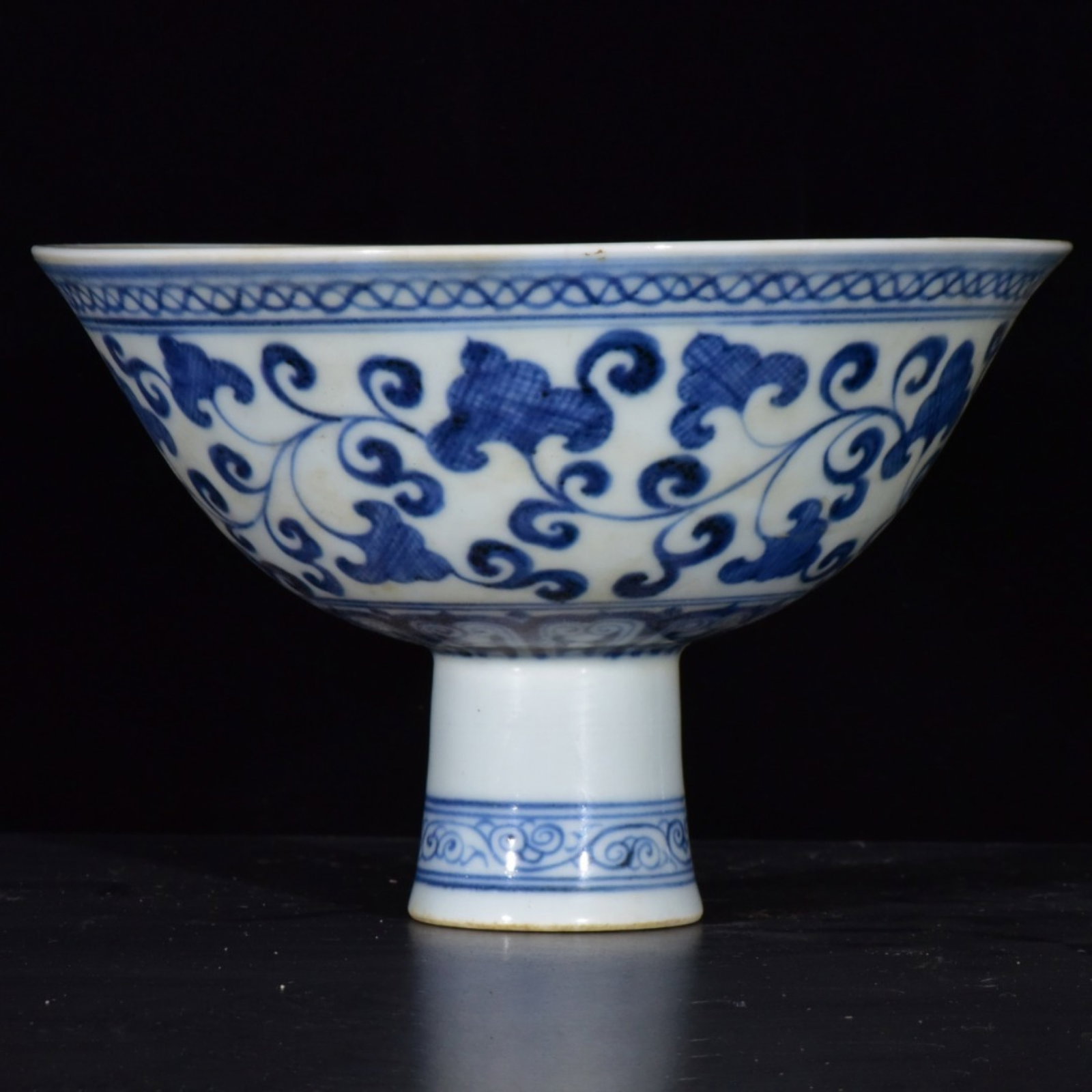 An Exquisite Blue and White Lotus Pattern Stem Bowl: An Exquisite Blue and White Lotus Pattern Stem Bowl,Ming Dynasty,China,Xuande Six-character Mark,Size:4.3inx6.7in