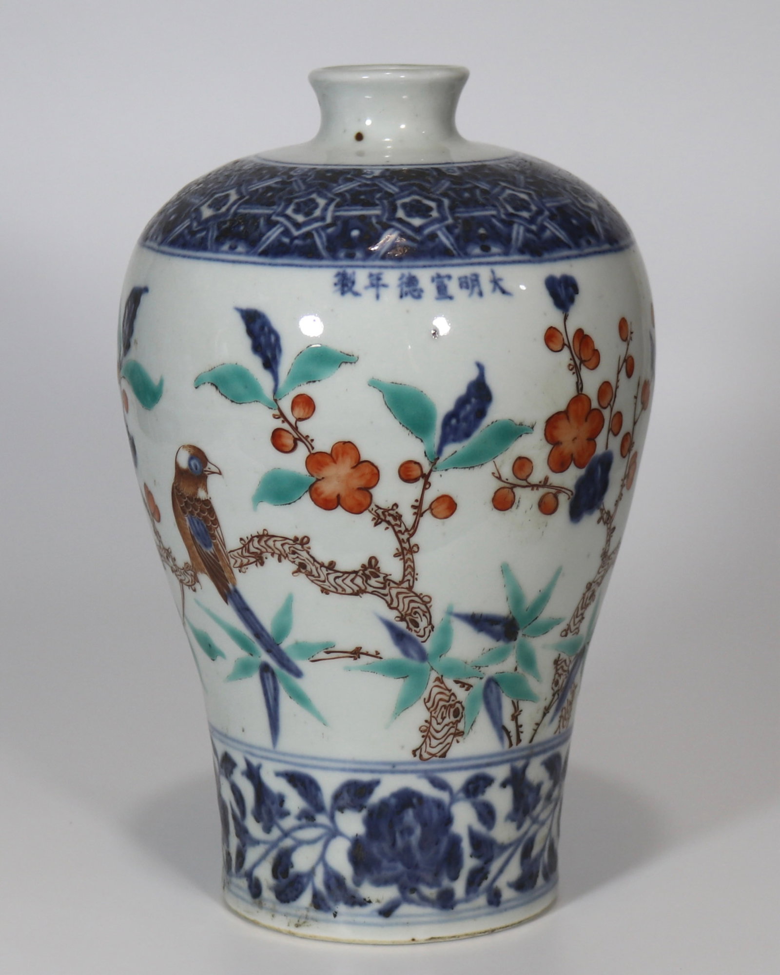 An Exquisite Blue and White Wucai Flower and Bird Pattern Vase: An Exquisite Blue and White Wucai Flower and Bird Pattern Vase,Ming Dynasty,China,Xuande Six-character Mark,Size:10.2in 青花五彩花鸟纹瓶,中国
