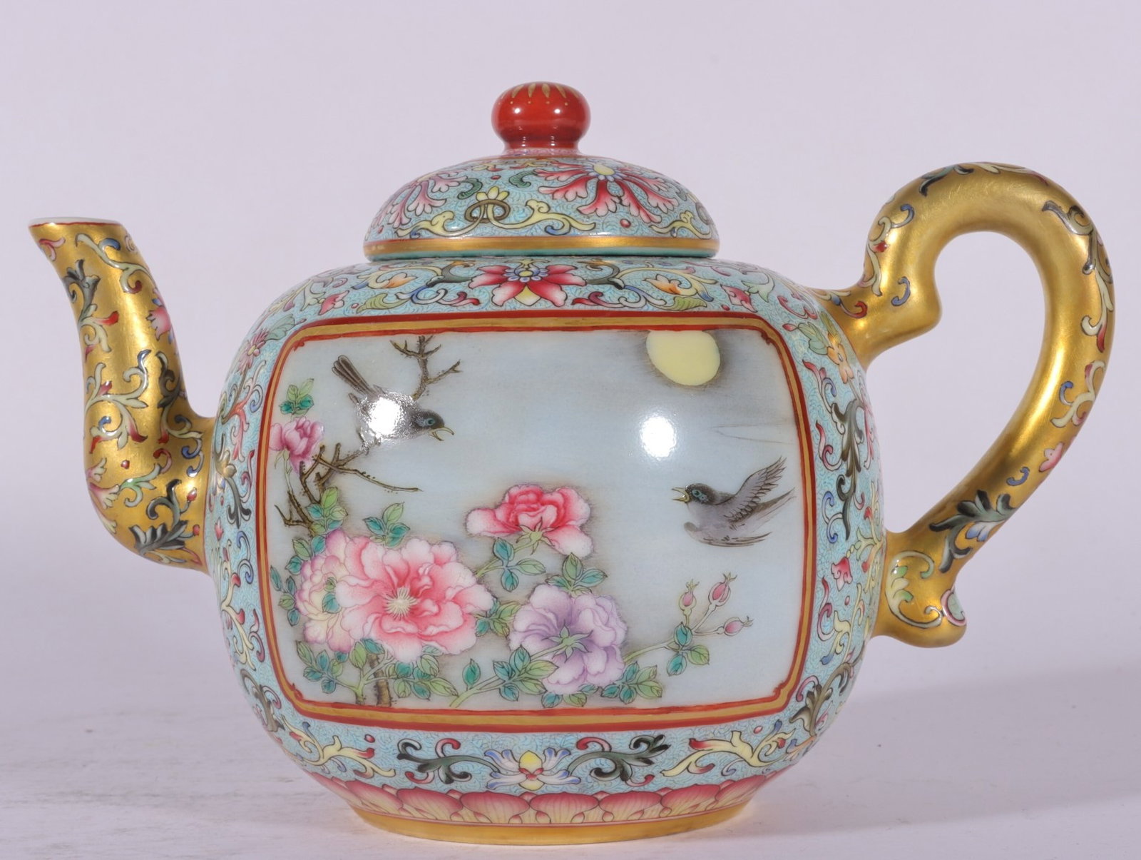 An Exquisite Green Ground Enamel Flower and Bird Pattern Teapot,with poem: An Exquisite Green Ground Enamel Flower and Bird Pattern Teapot,with poem,Qing Dynasty,China,Qianlong Four-character Mark,Size:5.5inx4.7in
