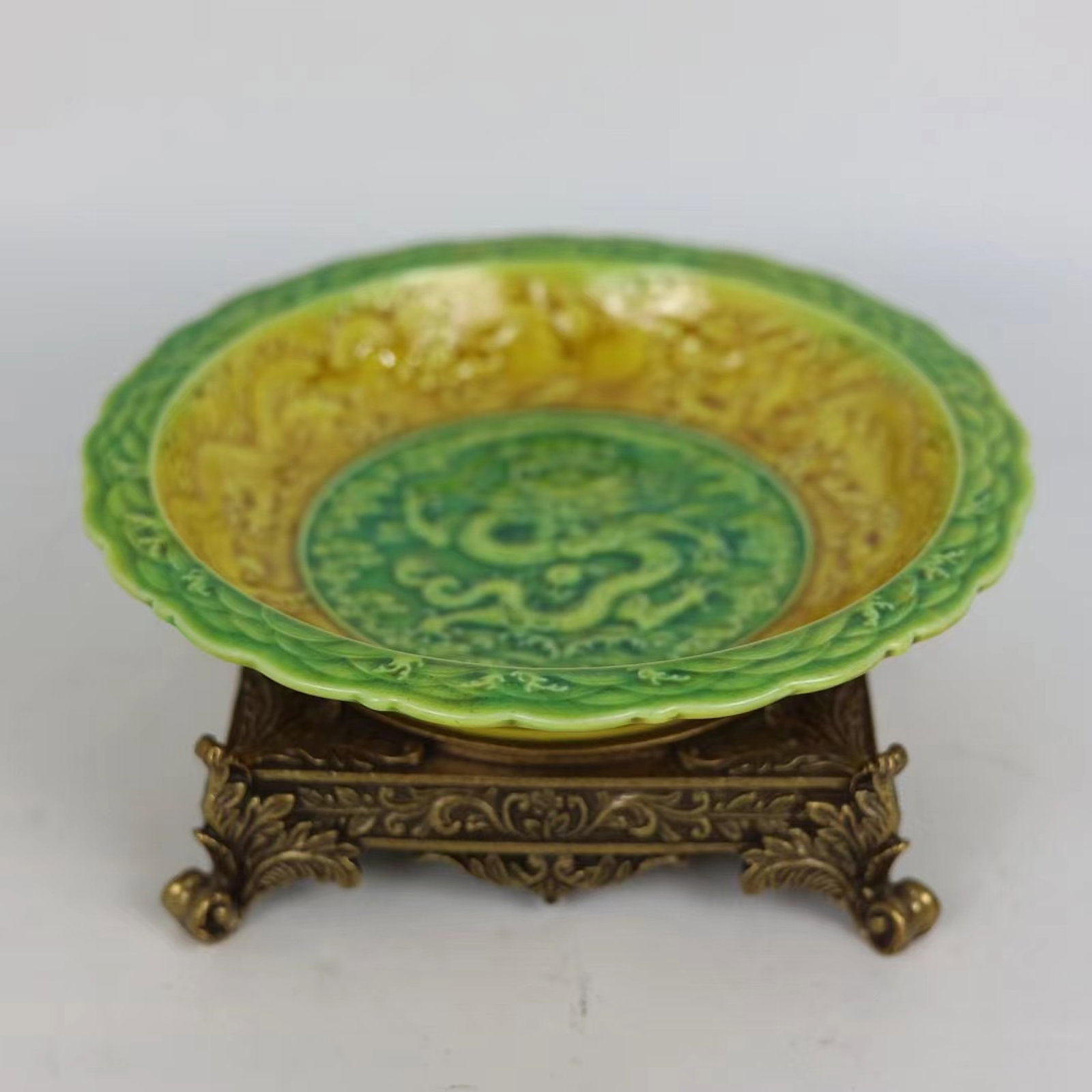 An Exquisite Green Glazed Inlaid Gilt Bronze Auspicious Cloud and Dragon Pattern Plate: An Exquisite Green Glazed Inlaid Gilt Bronze Auspicious Cloud and Dragon Pattern Plate,Ming Dynasty,China,Hongzhi Six-character Mark,Size:3inx7.9in