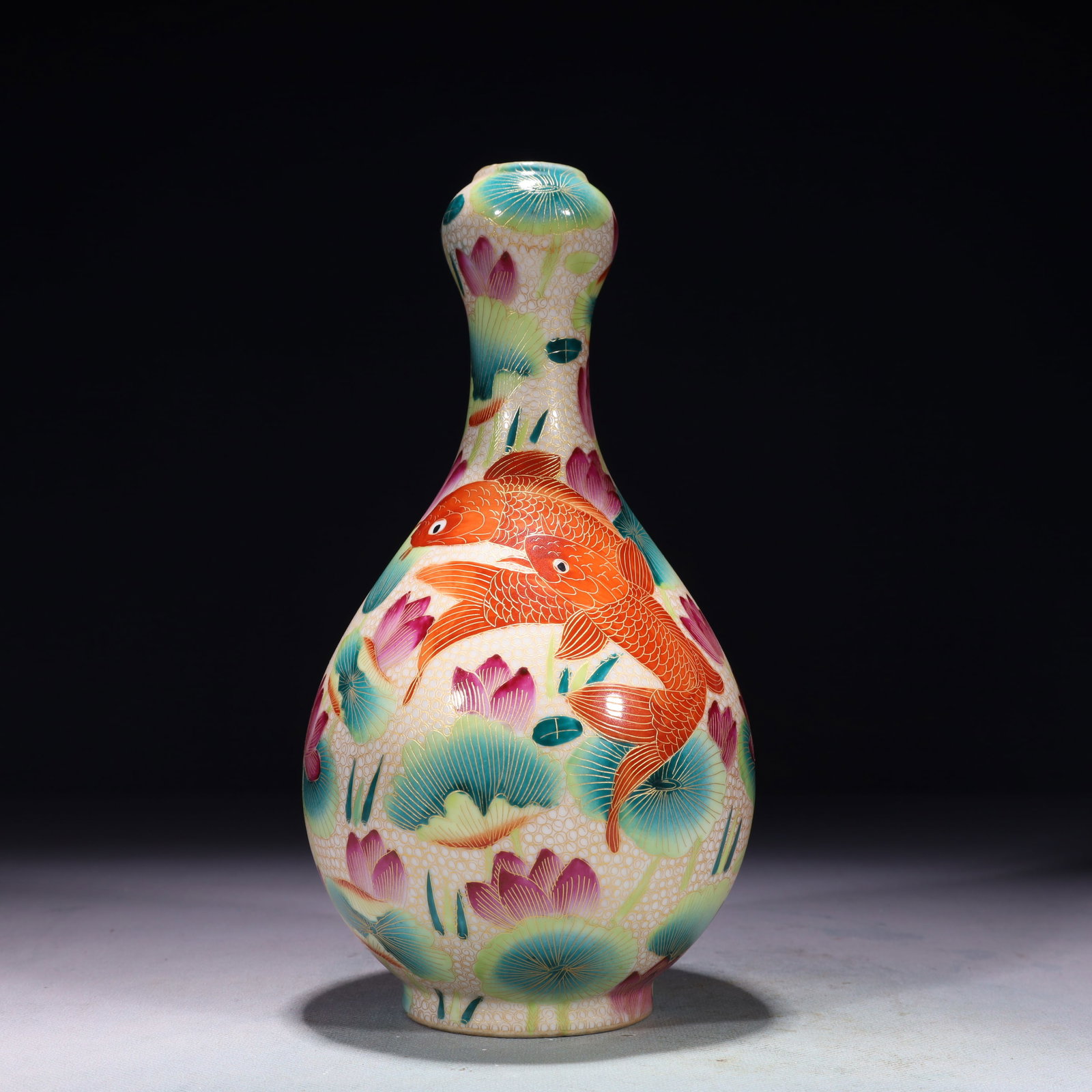 An Exquisite Famille-Rose Flower and Fish Pattern Vase: An Exquisite Famille-Rose Flower and Fish Pattern Vase,Qing Dynasty,China,Qianlong Six-character Mark,Size:4.3inx9.4in,Weight:1500g