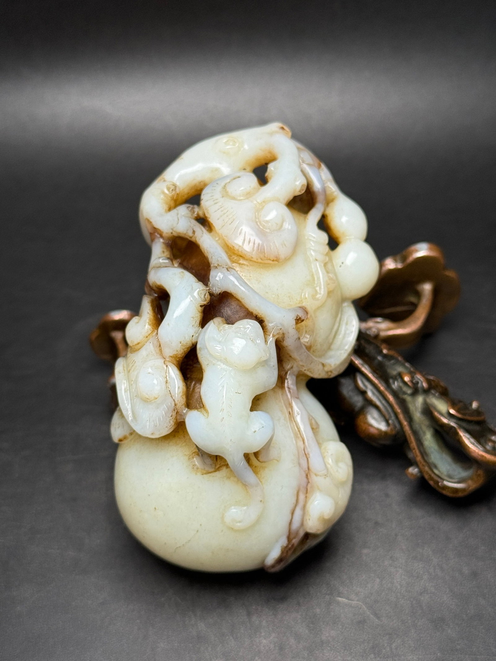 An Exquisite White Jade Ganoderma lucidum Monkey Pattern Gourd Pendant (1 of 7)