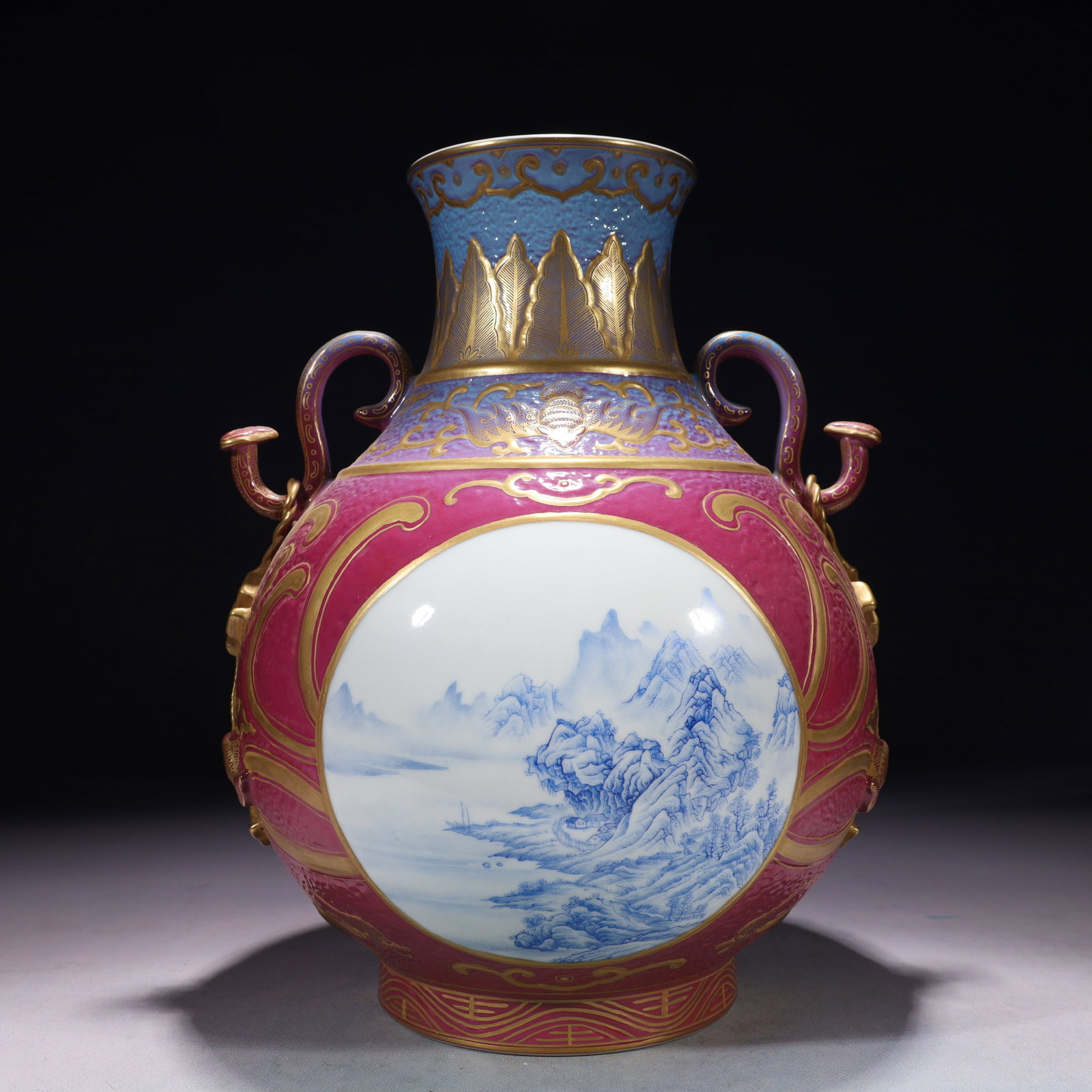 An Exquisite Ruby Red-Glazed Blue Glazed Painted Gold Landscape Pattern Double-Ears Vase: An Exquisite Ruby Red-Glazed Blue Glazed Painted Gold Landscape Pattern Double-Ears Vase,Qing Dynasty,China,Qianlong Six-character Mark,Size:9.8inx13.8in,Weight:4350g 胭脂红蓝&