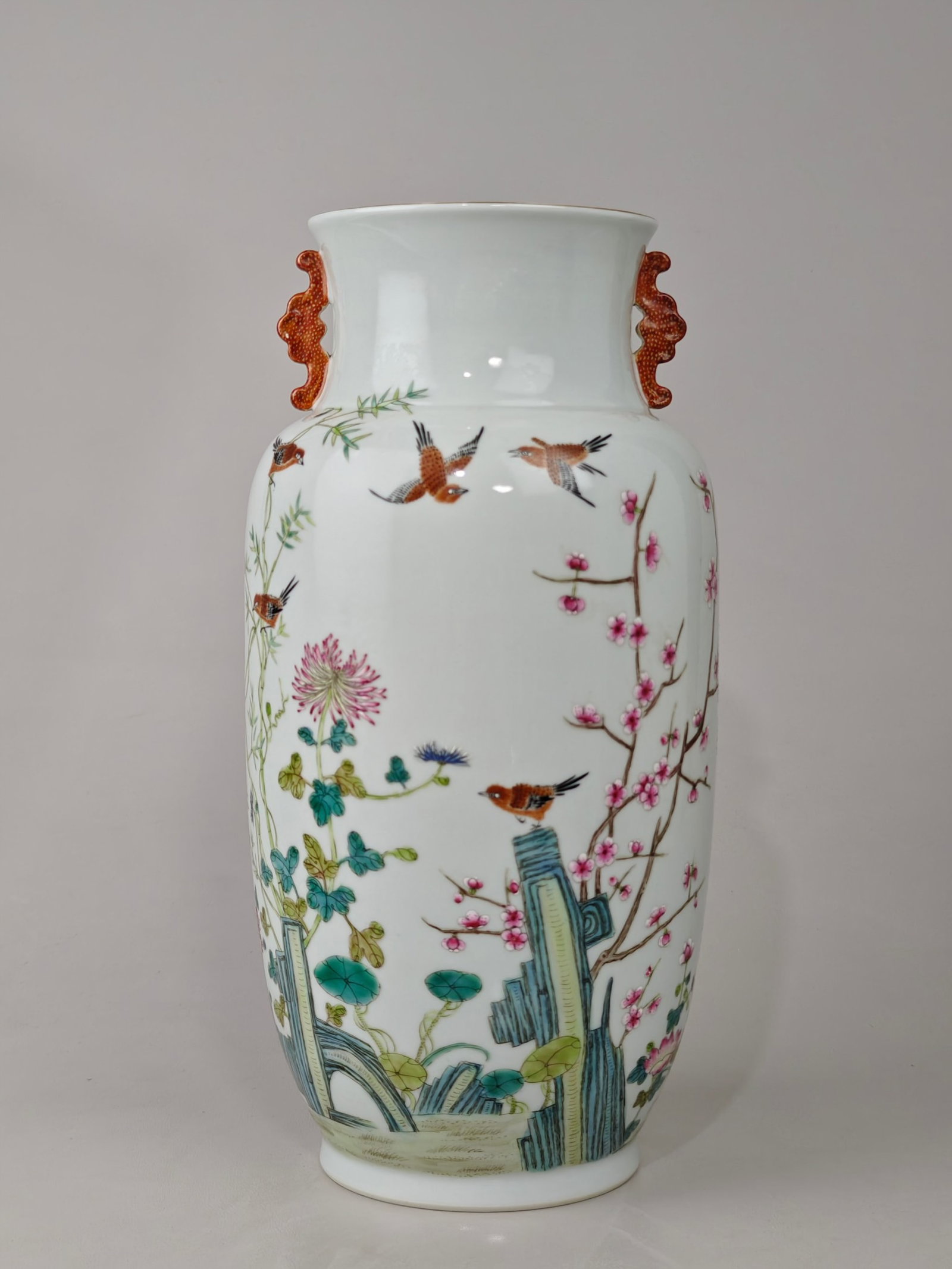 A Rare Famille-Rose Flower and Bird Pattern Double-Ears Vase: A Rare Famille-Rose Flower and Bird Pattern Double-Ears Vase,Qing Dynasty,China,Qianlong Six-character Mark,Size:12.6inx6.7in 粉彩花鸟纹双耳瓶,中&