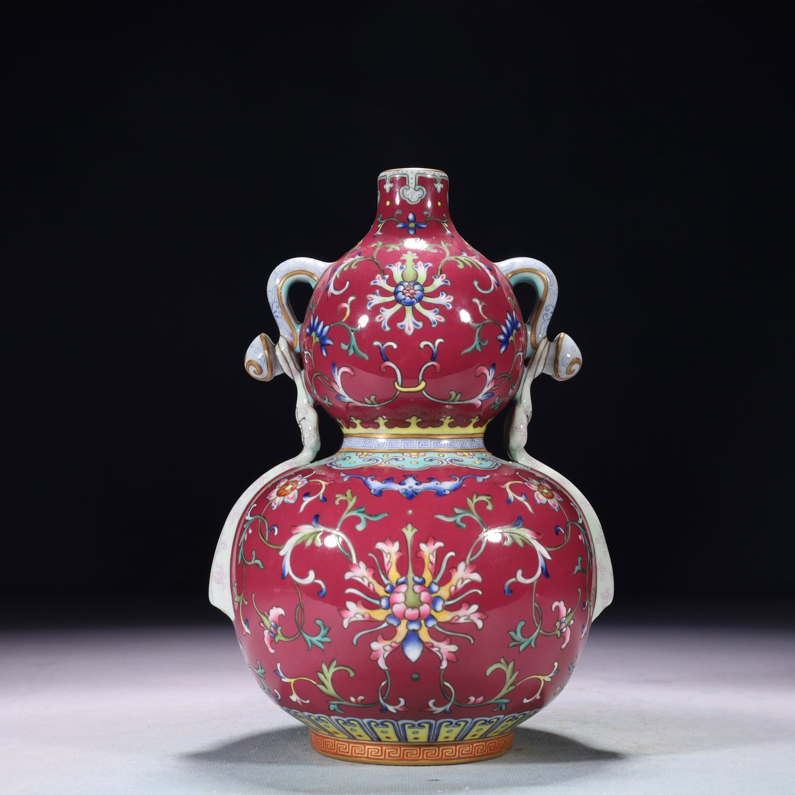 An Exquisite Famille-Rose Lotus Pattern Double-Ears Gourd-Shaped Vase: An Exquisite Famille-Rose Lotus Pattern Double-Ears Gourd-Shaped Vase,Qing Dynasty,China,Qianlong Six-character Mark,Size:5.1inx8.7in,Weight:1100g 粉彩缠枝莲纹Ö