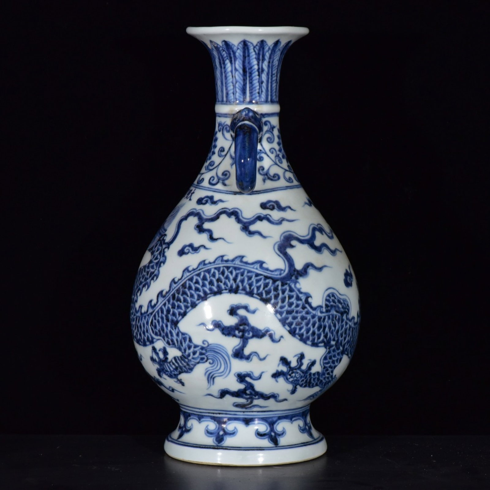 A Rare Blue and White Auspicious Cloud and Dragon Pattern Double-Ears Vase: A Rare Blue and White Auspicious Cloud and Dragon Pattern Double-Ears Vase,Ming Dynasty,China,Xuande Six-character Mark,Size:11.8inx6.3in 青花祥云龙纹双೑