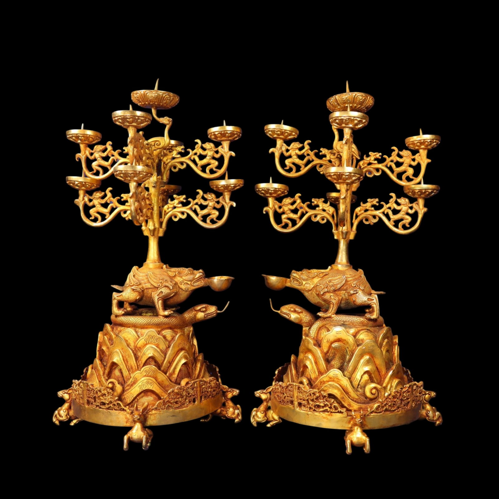 A Pair of Exquisite Gilt Bronze Beast Candlesticks: A Pair of Exquisite Gilt Bronze Beast Candlesticks,Qing Dynasty,China,Size:18.1inx9.8in,Weight:14550g 一对铜鎏金兽烛台,中国清代