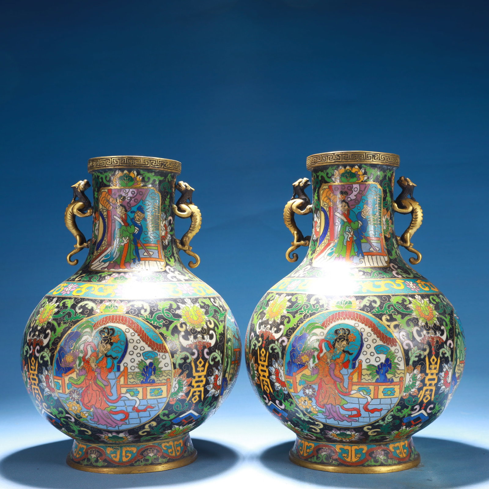 A Pair of Exquisite Cloisonne Character and Story Pattern Double-Ears Vases: A Pair of Exquisite Cloisonne Character and Story Pattern Double-Ears Vases,Ming Dynasty,China,Xuande Mark,Size:6.3inx9.8in,Weight:5300g 一对景泰蓝人物故