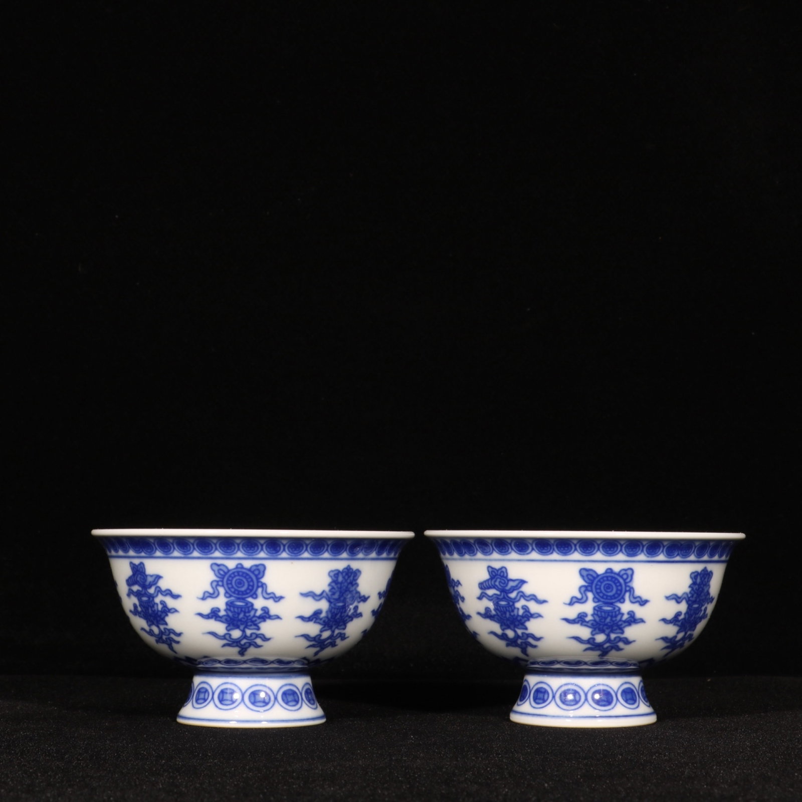 A Pair of Exquisite Blue and White Eight Treasures Pattern Cups: A Pair of Exquisite Blue and White Eight Treasures Pattern Cups,Qing Dynasty,China,Yongzheng Six-character Mark,Size:2inx3.3in