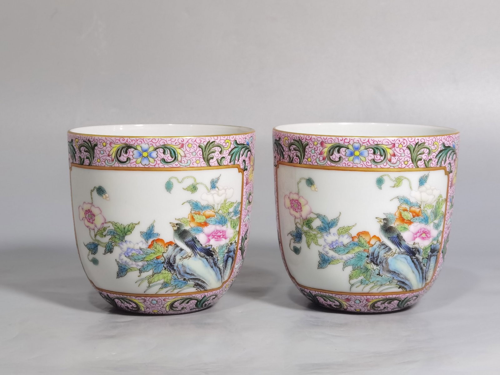 A Pair of Exquisite Famille-Rose Flower and Bird Pattern Cups: A Pair of Exquisite Famille-Rose Flower and Bird Pattern Cups,Qing Dynasty,China,Qianlong Six-character Mark,Size:3inx2.8in 一对粉彩花鸟纹杯子,