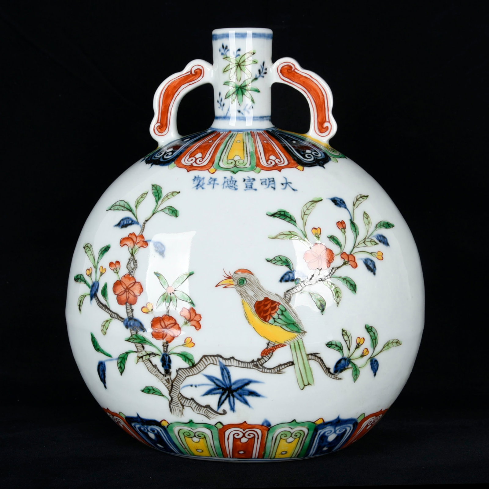 An Exquisite Blue and White Wucai Flower and Bird Pattern Double-Ears Vase: An Exquisite Blue and White Wucai Flower and Bird Pattern Double-Ears Vase,Ming Dynasty,China,Xuande Six-character Mark,Size: 10.2inx8.7inx5.9in 青花五彩花鸟纹