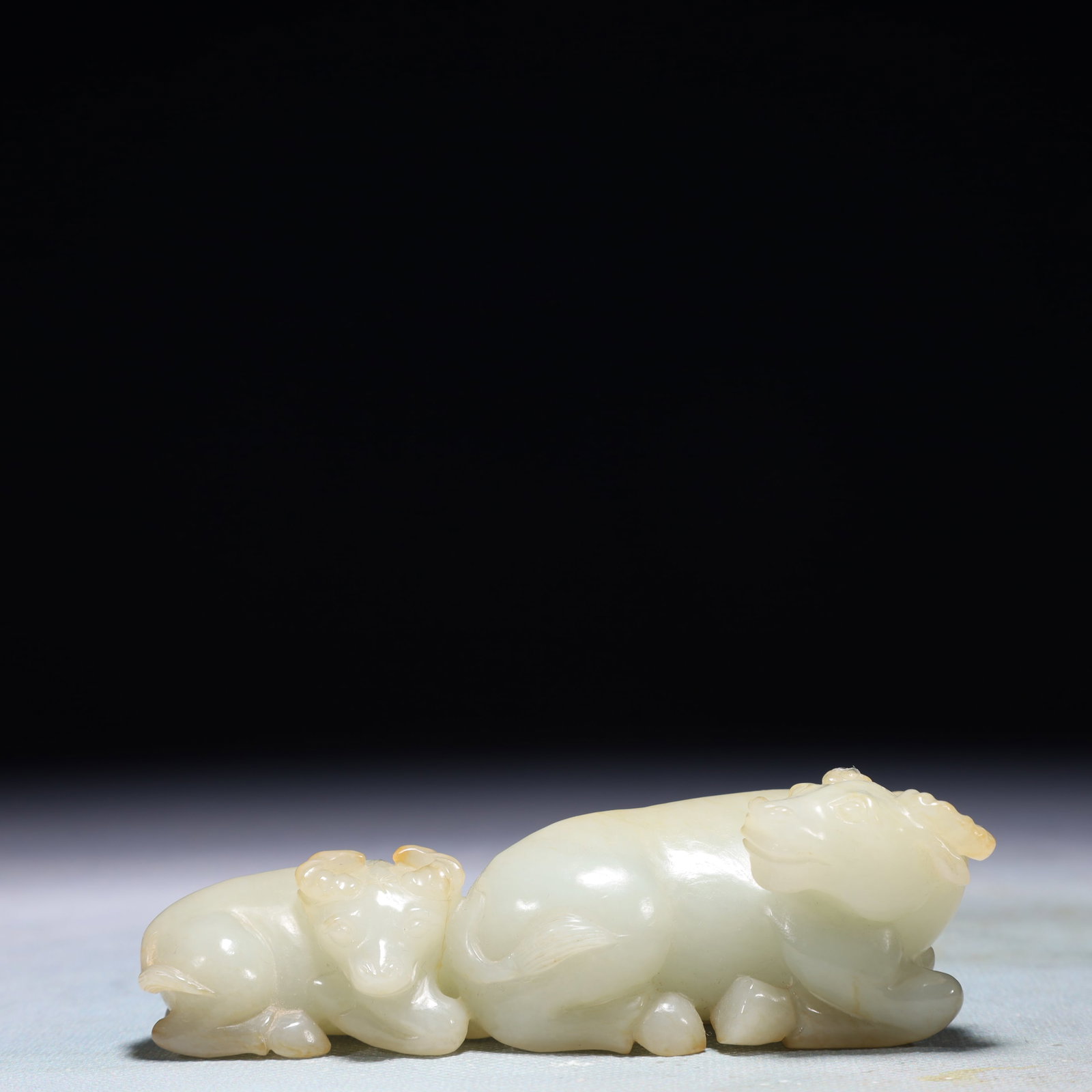 An Exquisite White Jade Buffalo Ornament: An Exquisite White Jade Buffalo Ornament,Qing Dynasty,China,Size:4.3inx1.4inx1.4in,Weight:216g 白玉牛摆件,中国清代