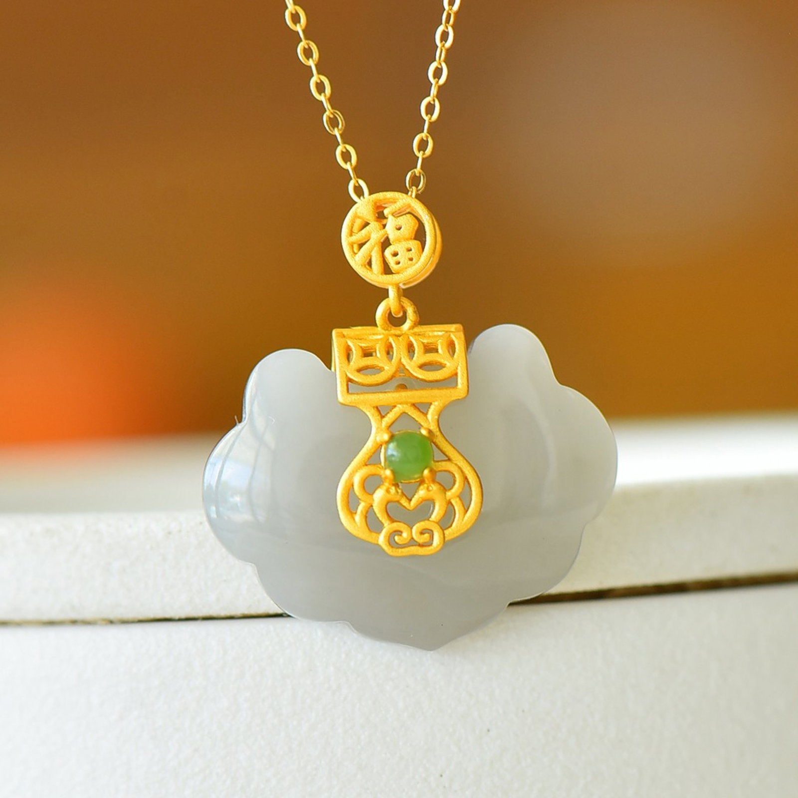An Exquisite Sterling Silver-Gold Plated Inlaid White Jade Pendant: An Exquisite Sterling Silver-Gold Plated Inlaid White Jade Pendant,Size:0.8inx1.1in 纯银镀金镶白玉吊坠