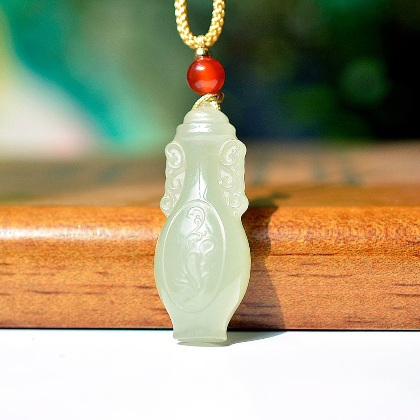 An Exquisite White Jade Vase Pendant