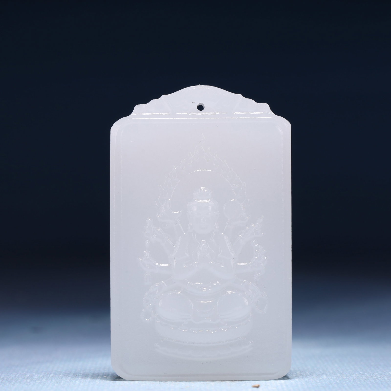 An Exquisite White Jade Statue of Thousand-hand Guanyin Pendant: An Exquisite White Jade Statue of Thousand-hand Guanyin Pendant,Size:1.6inx0.4inx2.4in,Weight:46g 白玉千手观音像牌