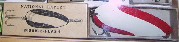 National Expert Musk-E-Flash Metal Fishing Lure in: National Expert Musk-E-Flash Metal Fishing Lure in great shape and includes nice box. I've posted a few photos. I didn't have any photos of the bottom, but the bottom is silver metal and has NO pittin