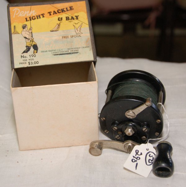Penn No. 190 reel in box. Has Beach type scene on: Penn No. 190 reel in box. Has Beach type scene on side .