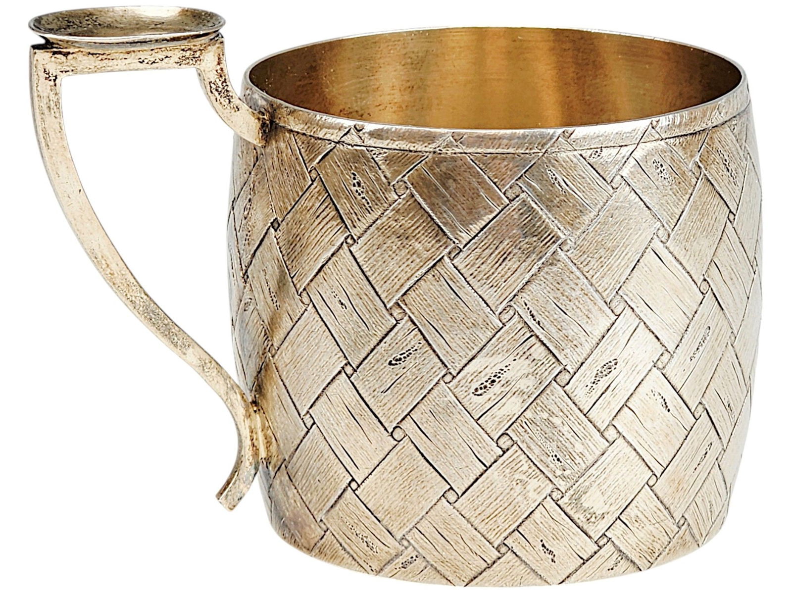 ANTIQUE 19TH C RUSSIAN SILVER TEA GLASS HOLDER OVCHINNIKOV: An antique Russian gilt silver tea glass holder, or podstakannik, executed in the trompe-l'oeil technique. Dated 19th century. Basket weave pattern. A gilt wash interior. Hallmark of 84 silver standar