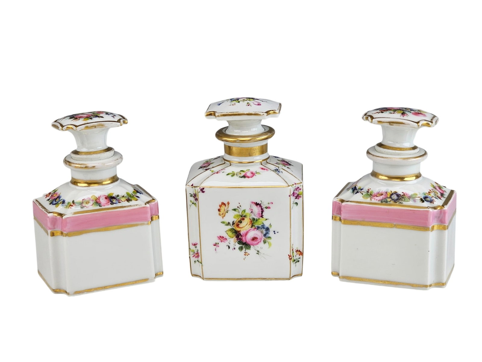 ANTIQUE FRENCH SEVRES STYLE PORCELAIN PERFUME BOTTLES: A group of three antique French Sevres-style porcelain perfume bottles with stoppers. Dated 19th century. Each bottle is hand-painted with floral decoration and gold ornaments. Unmarked. Keywords: Por