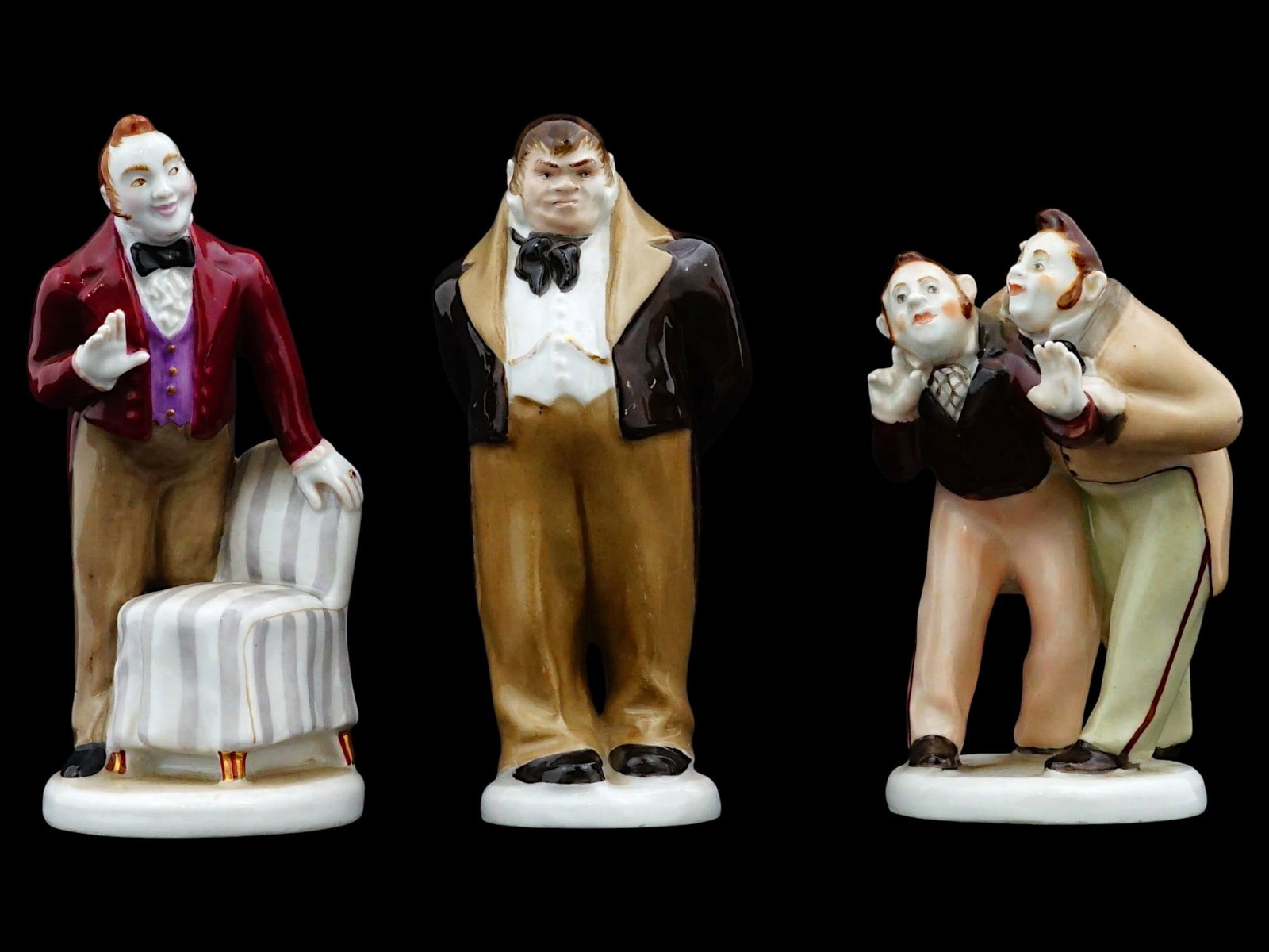 LFZ PORCELAIN GOGOL CHARACTERS DEAD SOULS FIGURINES: A fine group of three mid-20th-century Soviet porcelain figurines by the Lomonosov Porcelain Factory (LFZ), depicting famous literary characters by Nikolai Gogol. Modeled by Boris Vorobyev, the group 
