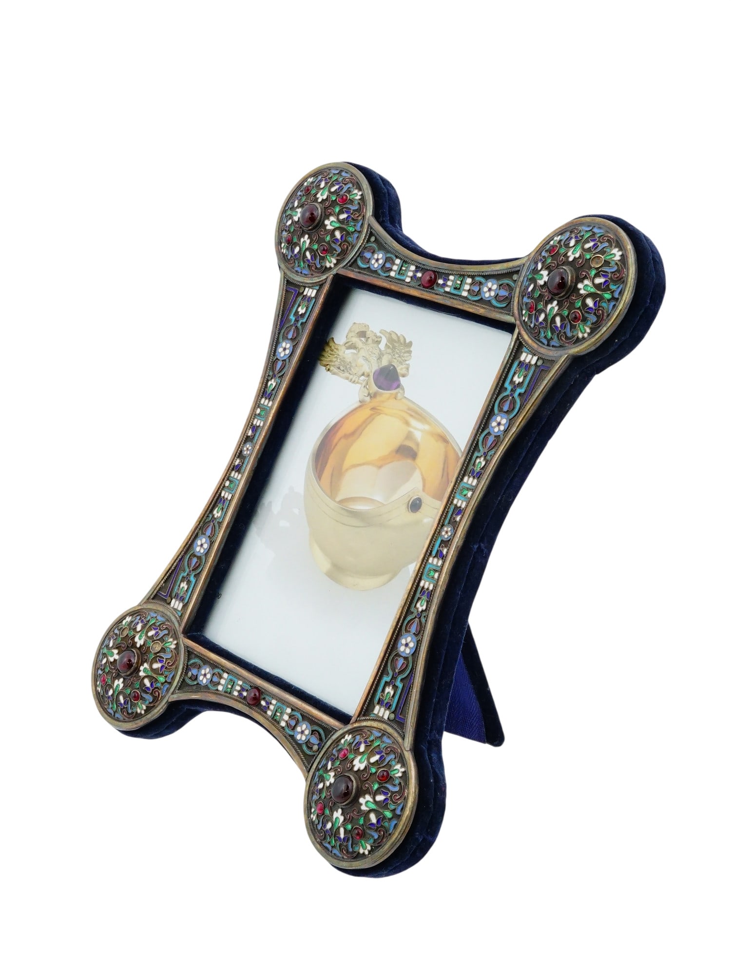 RUSSIAN IMPERIAL STYLE SILVER ENAMEL PICTURE FRAME: This Russian taste silver picture frame showcases exquisite cloisonne enamel work across an elegant hourglass silhouette. The outer borders and four large circular corner medallions are meticulously d