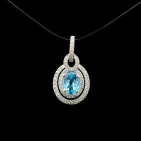 14k White Gold Blue Topaz and Diamond Halo Pendant