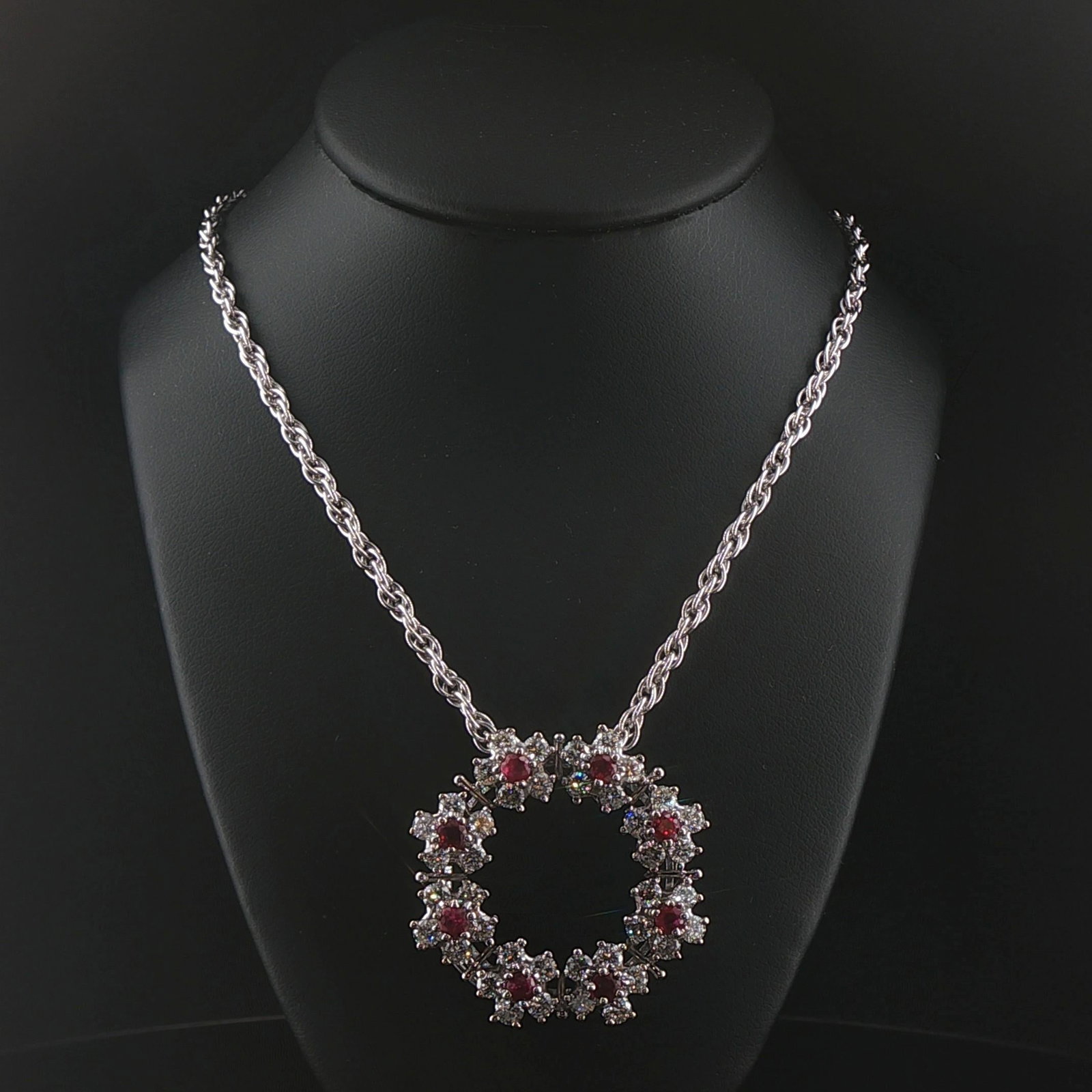 14k White Gold Ruby and 3.50cttw Diamond Solid Circle Pendant Necklace 23": Condition: Excellent Condition, Professionally Cleaned Metal: 14k Gold (Marked, and Professionally Tested) Weight: 26g Diamonds: 3.50cttw Round Cut Natural Diamonds Gemstones: Nine Round Cut Rubies 0.