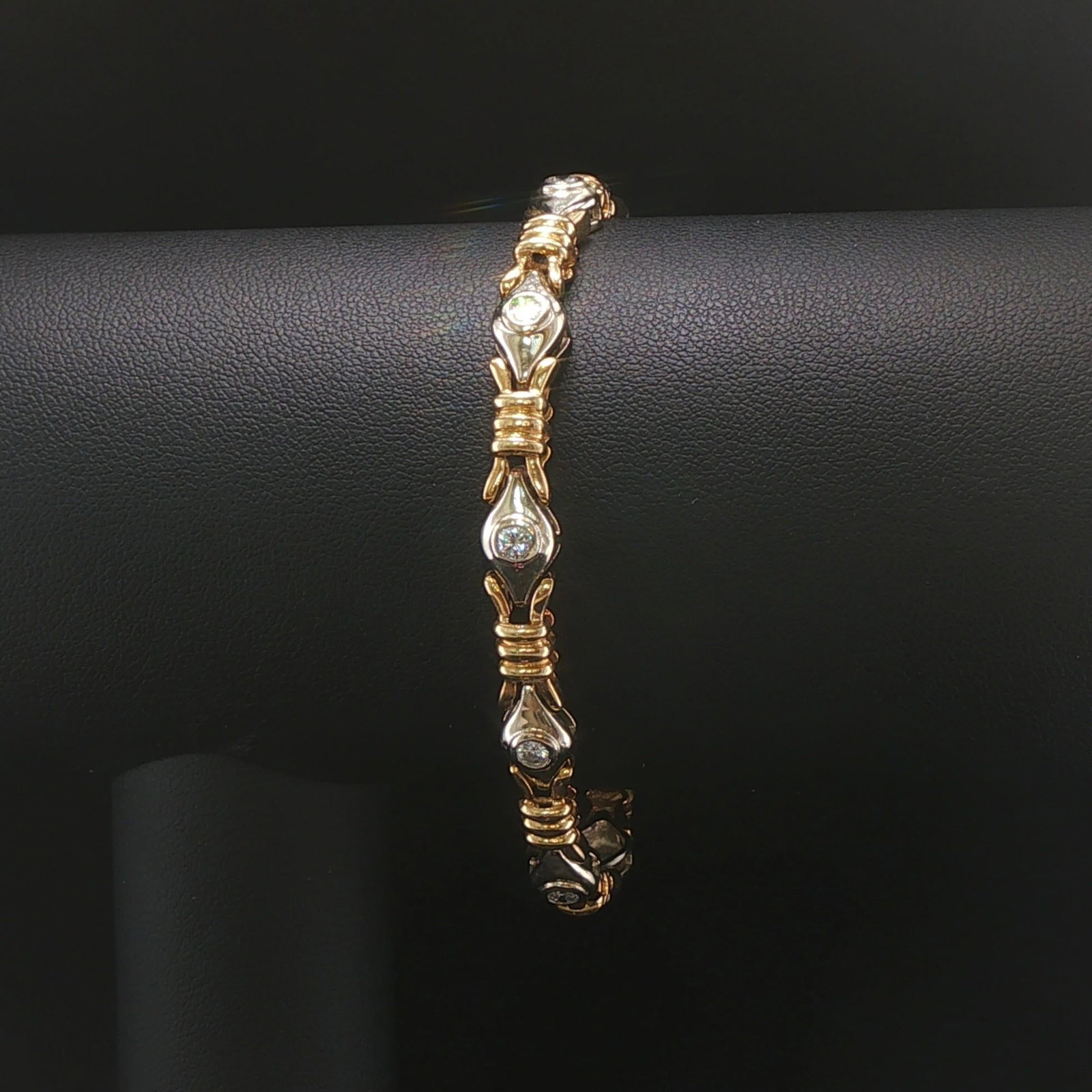 14k Yellow and White Gold 1.2cttw Diamond Fancy Link Bracelet 7": Condition: Excellent Condition, Professionally Cleaned Metal: 14k Gold (Marked, and Professionally Tested) Weight: 16.3g Diamonds: 1.2cttw Ten Round Cut Bezel Set Natural Diamonds Length: 7 Inches Wid