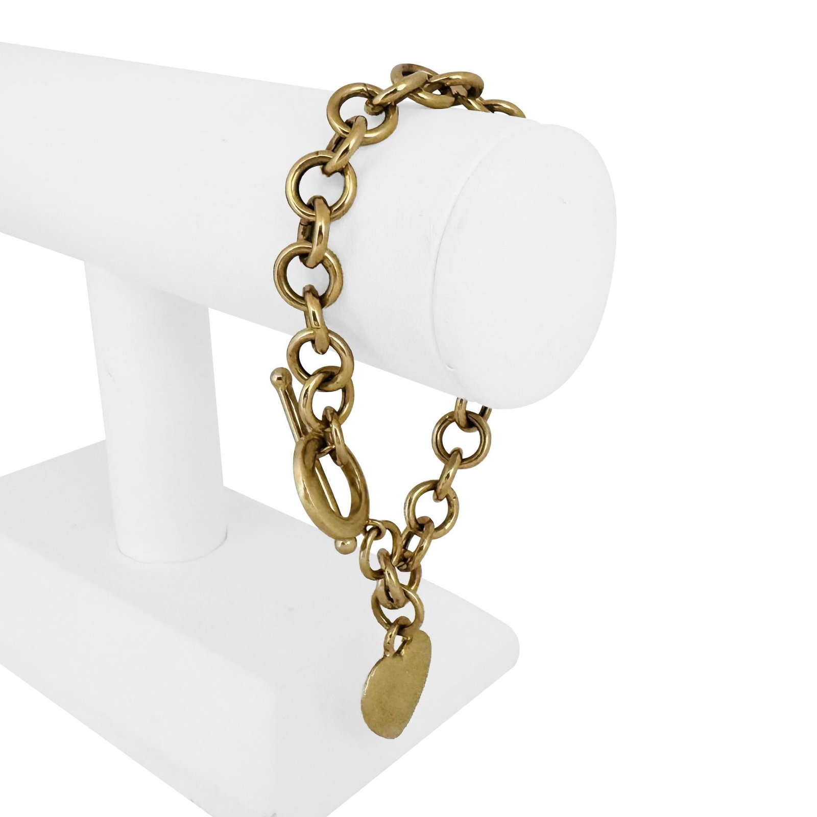 14k Yellow Gold Circle Link Bracelet with Heart Charm Toggle 7.5": Condition: Excellent Condition, Professionally Cleaned Metal: 14k Gold (Marked, and Professionally Tested) Weight: 22.6g Length: 7.5 Inches Width: 10mm Closure: Toggle T Bar Markings: "14K" Item #FCP9