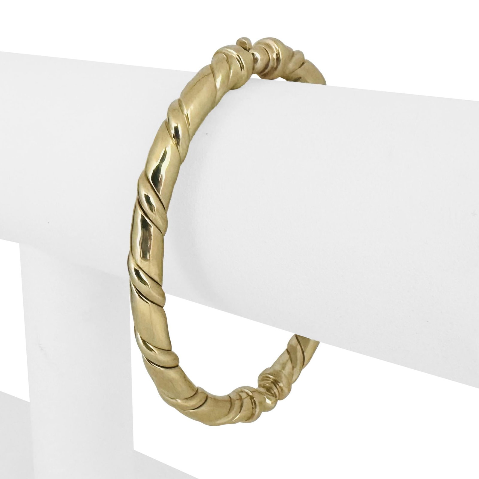 14k Yellow Gold Solid Heavy Twisted Bangle Bracelet Italy 6.75": Condition: Excellent Condition, Professionally Cleaned Metal: 14k Gold (Marked, and Professionally Tested) Weight: 23.8g Length: 6.75 Inches Inner Circumference Width: 5.5mm Closure: Box Tab Insert Ma