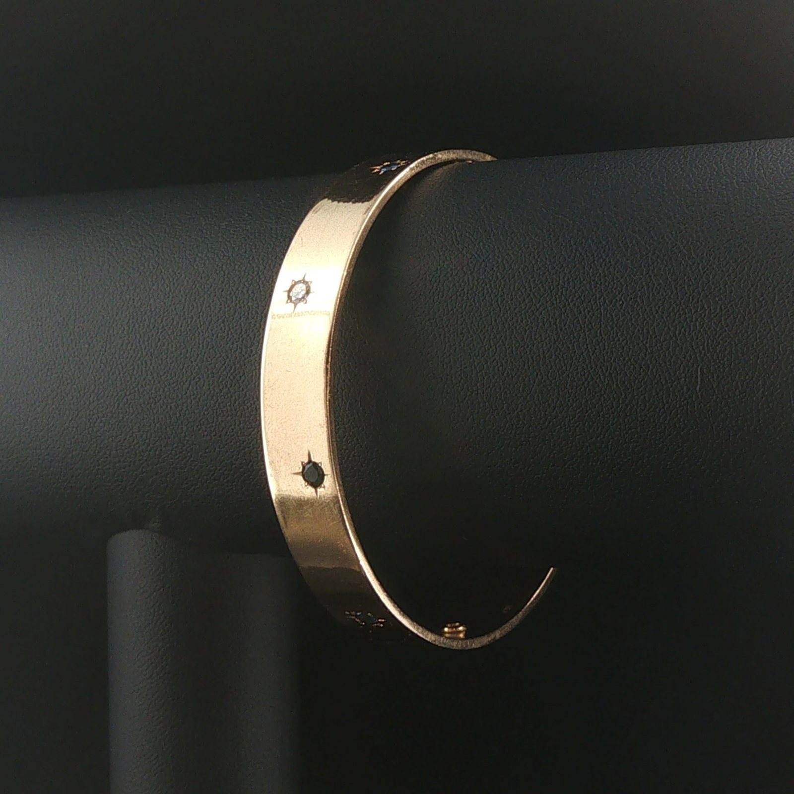 14k Yellow Gold Solid Heavy Diamond Sapphire & Emerald Bangle Bracelet 7.5": Condition: Excellent Condition, Professionally Cleaned Metal: 14k Gold (Marked, and Professionally Tested) Weight: 37.3g Diamonds: Three Round Cut Natural Diamonds 0.15cttw Gemstones: Three Round Cut 