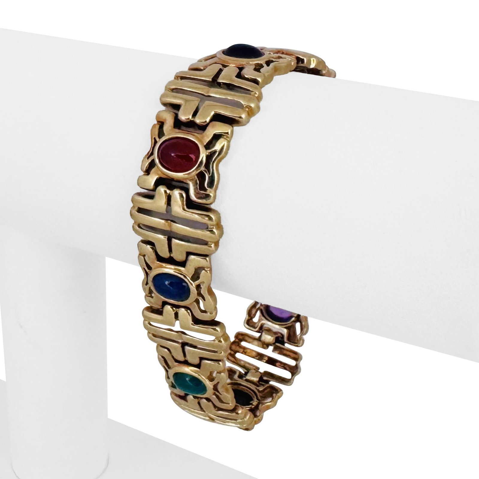 14k Yellow Gold Heavy Multi Cabochon Gemstone Fancy Link Bracelet 7": Condition: Excellent Condition, Professionally Cleaned Metal: 14k Gold (Marked, and Professionally Tested) Weight: 40g Length: 7 Inches Gemstones: Cabochon Amethyst, Green Onyx, Black Onyx, Carnelian,
