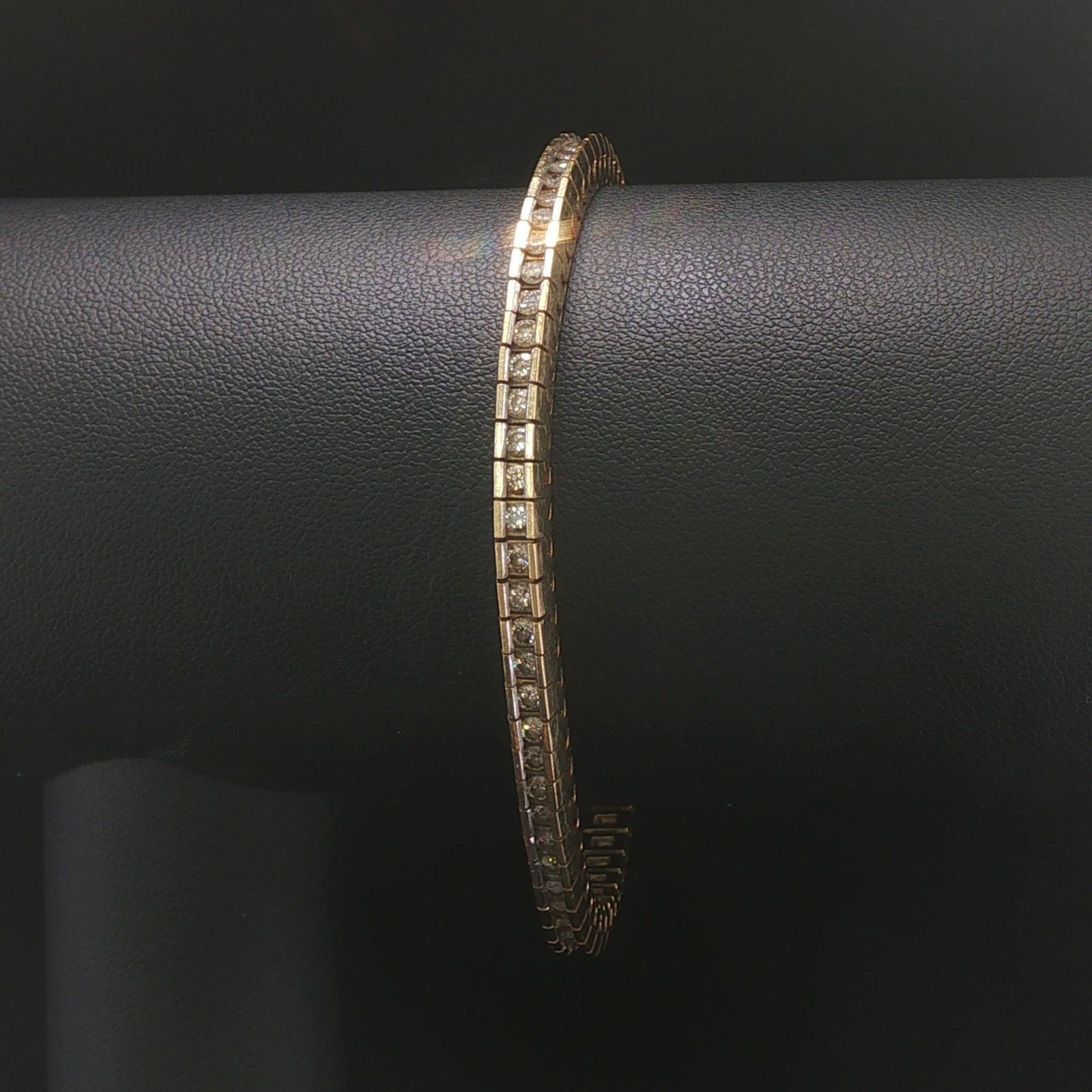 14k Yellow Gold and 1cttw Channel Set Diamond Heavy Vintage Bracelet 7.25": Condition: Excellent Condition, Professionally Cleaned Metal: 14k Gold (Marked, and Professionally Tested) Weight: 22.3g Diamonds: 1cttw Round Cut Natural Diamonds Length: 7.25 Inches Width: 4mm Closu