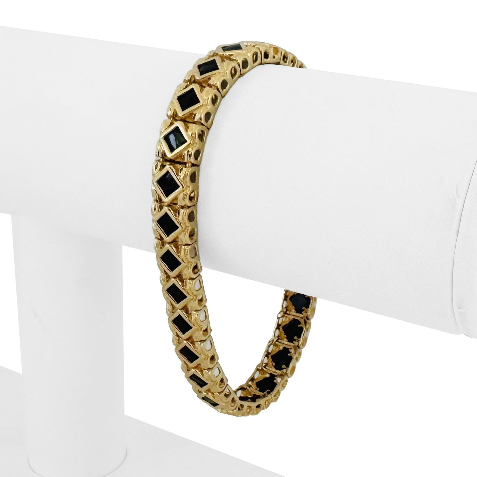 14k Yellow Gold and Onyx Solid Diamond Cut Fancy Link Bracelet 7.5": Condition: Excellent Condition, Professionally Cleaned Metal: 14k Gold (Marked, and Professionally Tested) Weight: 22g Gemstones: Square Cut Black Onyx Length: 7.5 Inches Width: 7mm Closure: Box Tab I