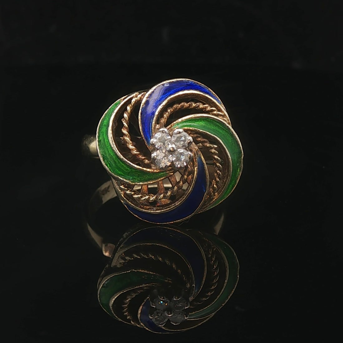 14k Yellow Gold Enamel and Diamond Vintage Swirl Ring Size 6.75: Condition: Excellent Condition, Professionally Cleaned Metal: 14k Gold (Professionally Tested) Weight: 7g Diamonds: 0.10cttw Round Cut Natural Diamonds Width: 17.5mm at face, 3.5mm at back Size: 6.75 