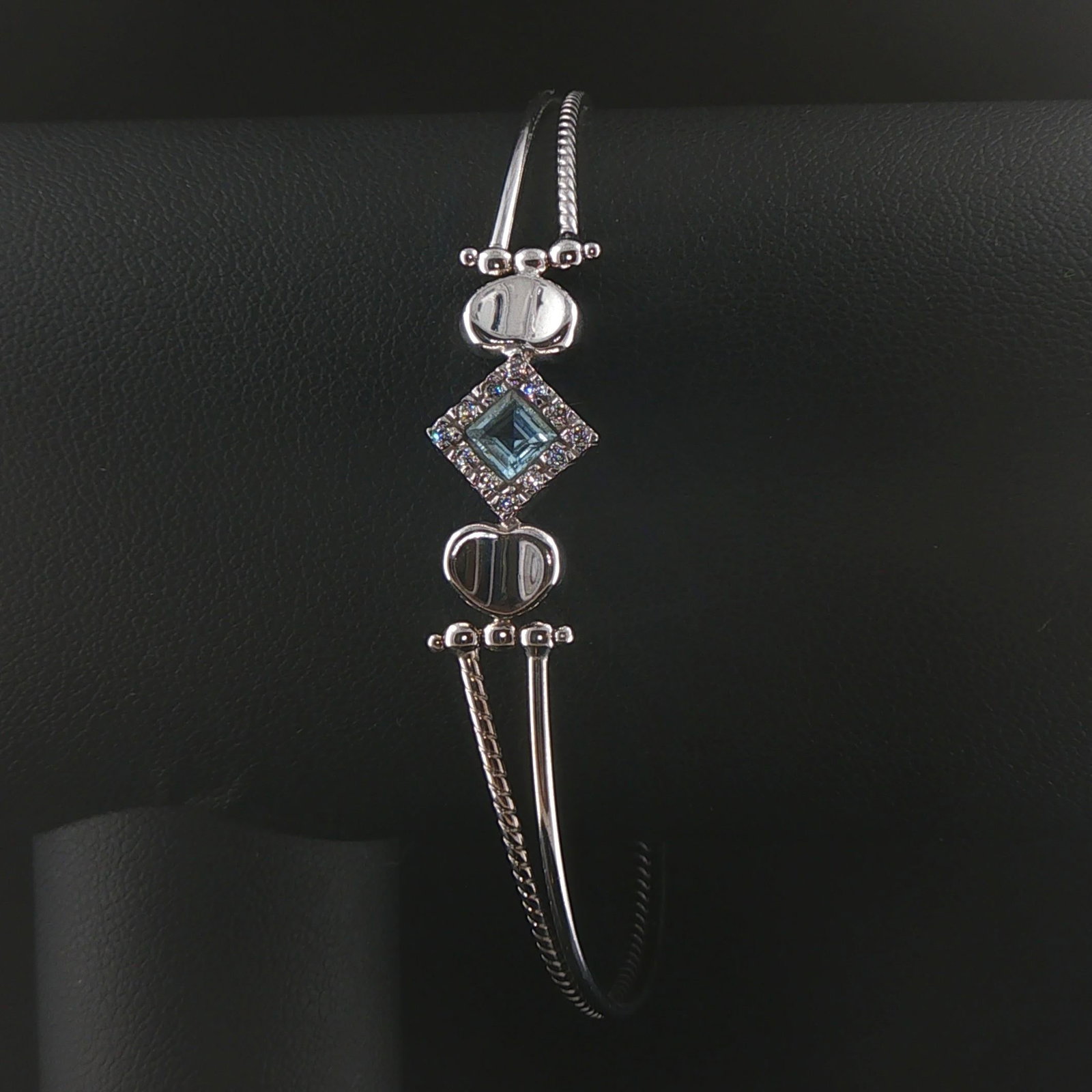 18k White Gold Aquamarine and Diamond Fancy Bracelet Italy 7": Condition: Excellent Condition, Professionally Cleaned Metal: 18k Gold (Marked, and Professionally Tested) Weight: 6.6g Gemstone: Square Cut Aquamarine Diamonds: 0.12cttw Round Cut Natural Diamonds Le