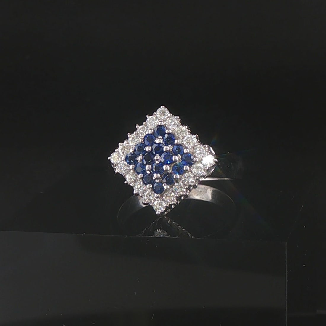 18k White Gold Blue Sapphire and 0.50cttw Diamond Ring Size Italy 7.5: Condition: Excellent Condition, Professionally Cleaned Metal: 18k Gold (Marked, and Professionally Tested) Weight: 8.2g Gemstone: Round Cut Blue Sapphires Diamonds: 0.50cttw Round Cut Natural Diamonds