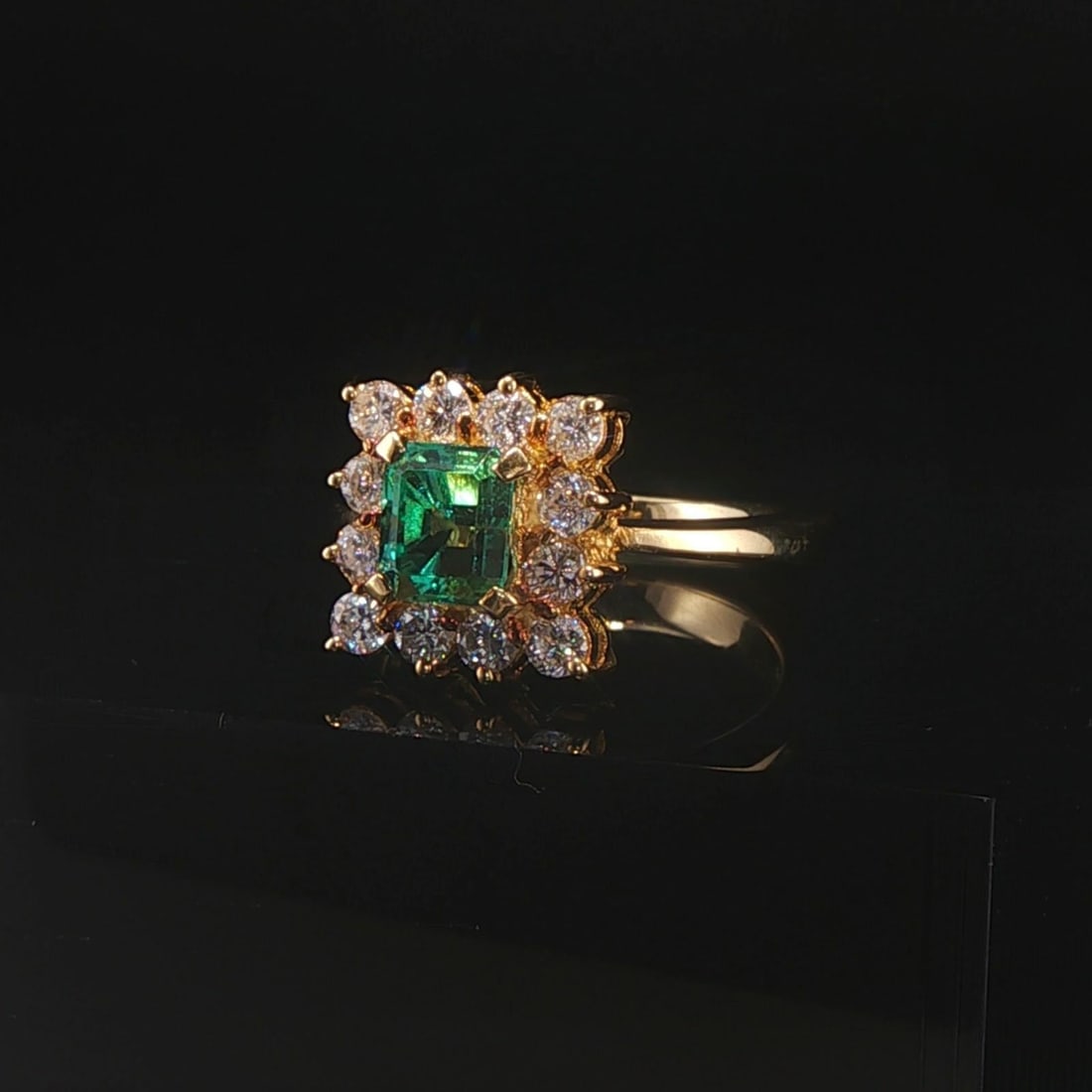 18k Yellow Gold 0.88ct Emerald and 0.62cttw Diamond Halo Ring Size 4.75: Condition: Excellent Condition, Professionally Cleaned Metal: 18k Gold (Marked, and Professionally Tested) Weight: 6.2g Gemstone: 0.88ct Emerald Cut Emerald Diamonds: 0.62cttw Round Cut Natural Diamon